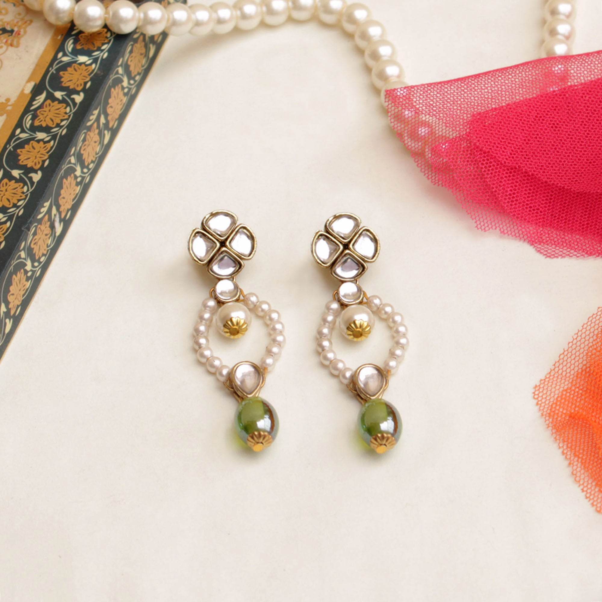 Traditional Kundan earrings in gold-tone, perfect for weddings and festive wear