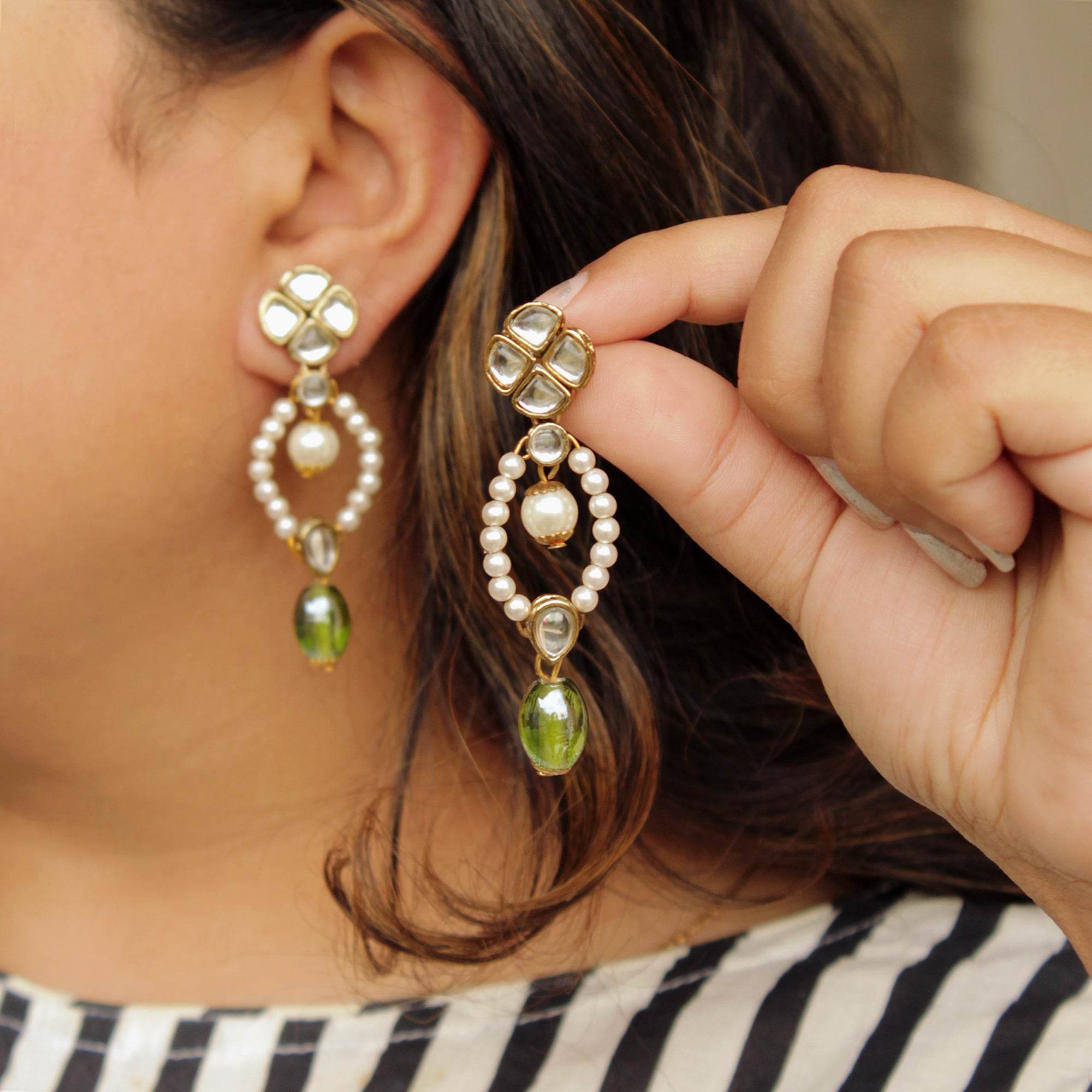 Traditional Kundan earrings in gold-tone, perfect for weddings and festive wear