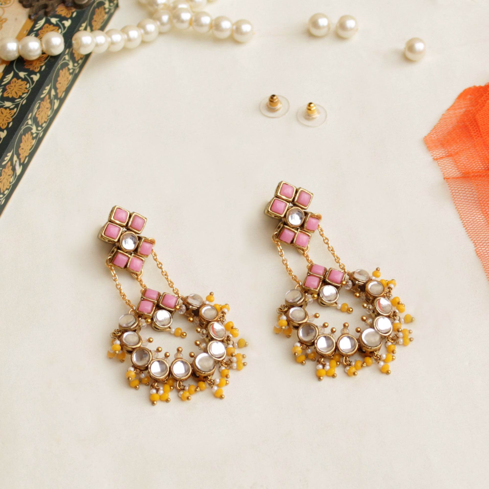 Traditional Kundan earrings in gold-tone, perfect for weddings and festive wear