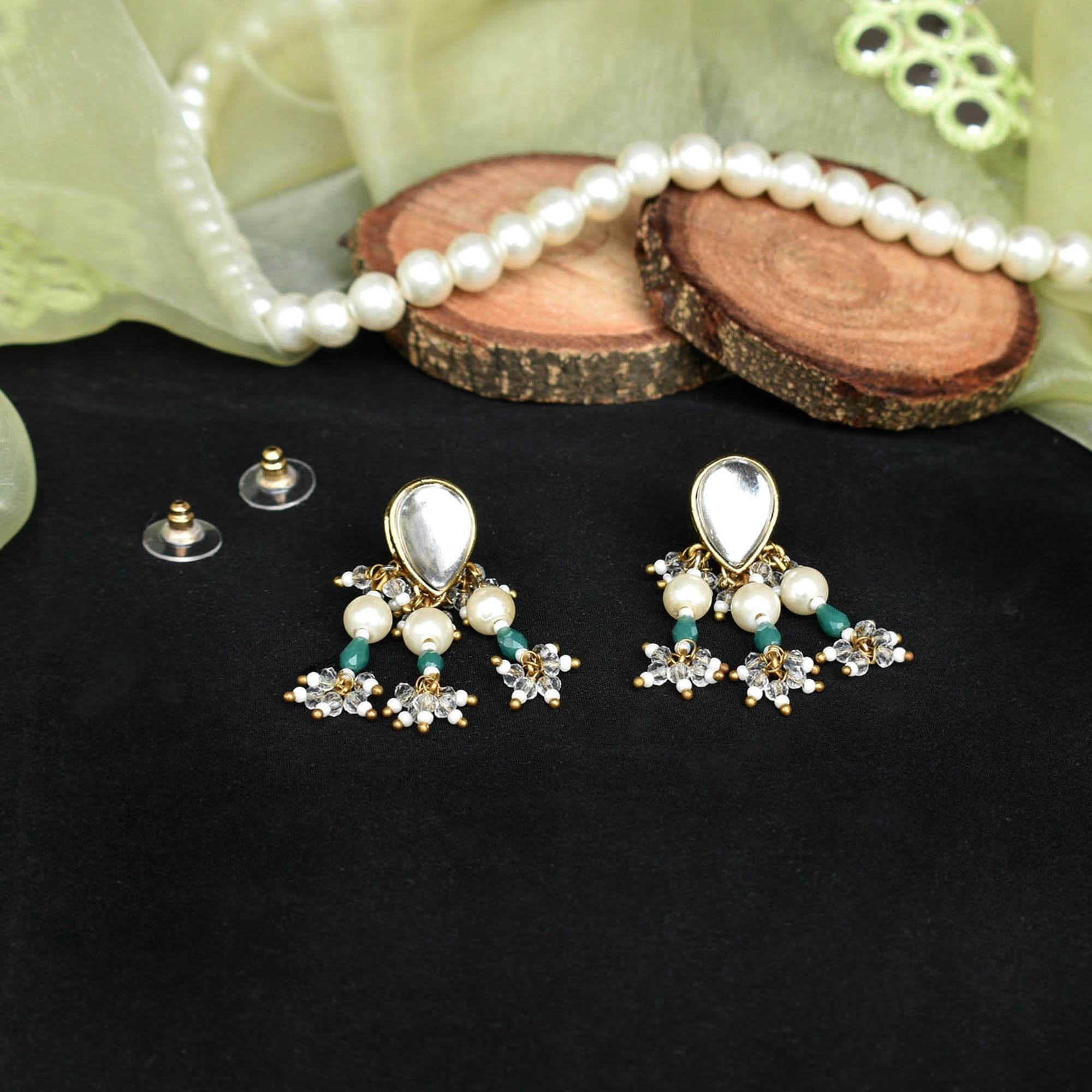 Traditional Kundan earrings in gold-tone, perfect for weddings and festive wear