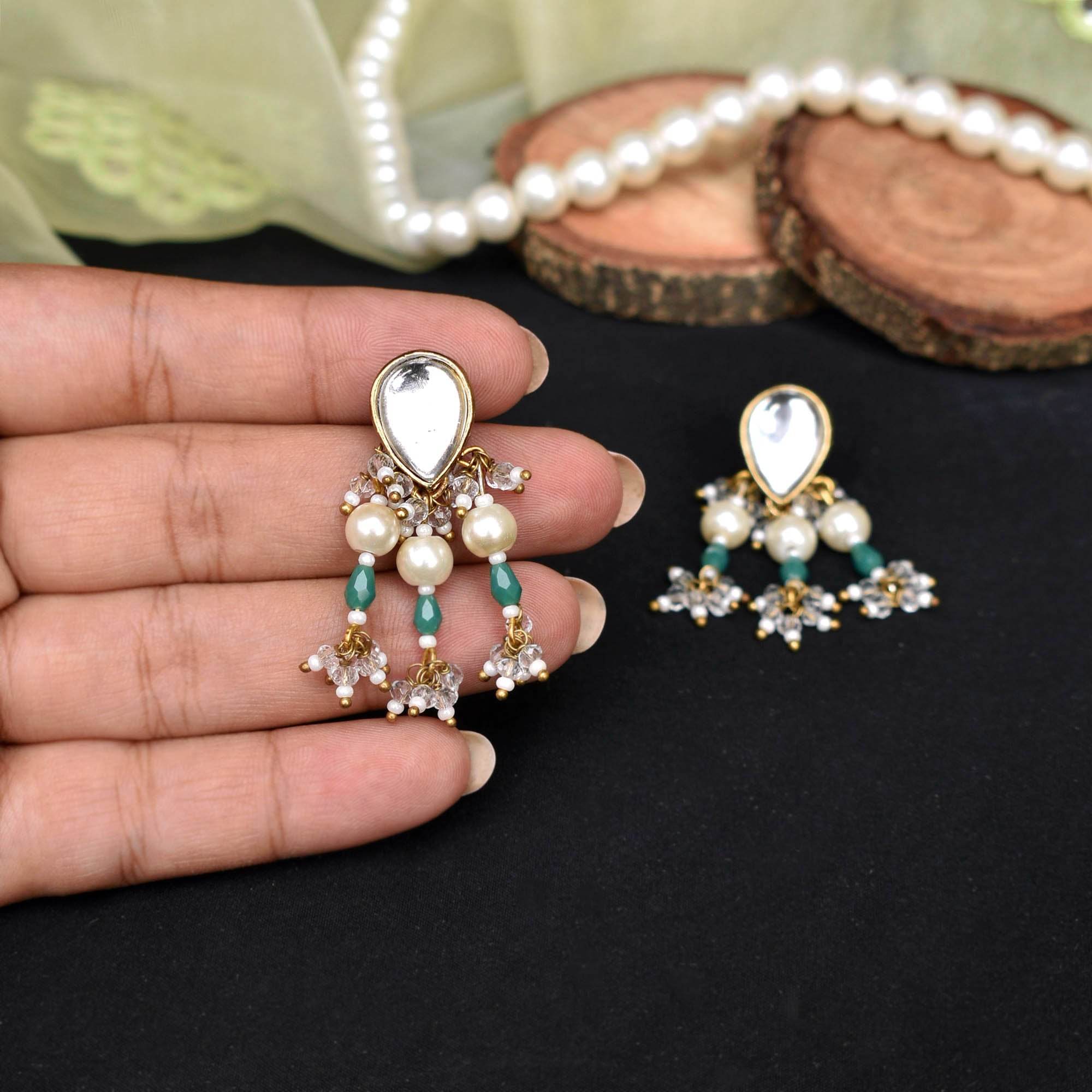 Traditional Kundan earrings in gold-tone, perfect for weddings and festive wear