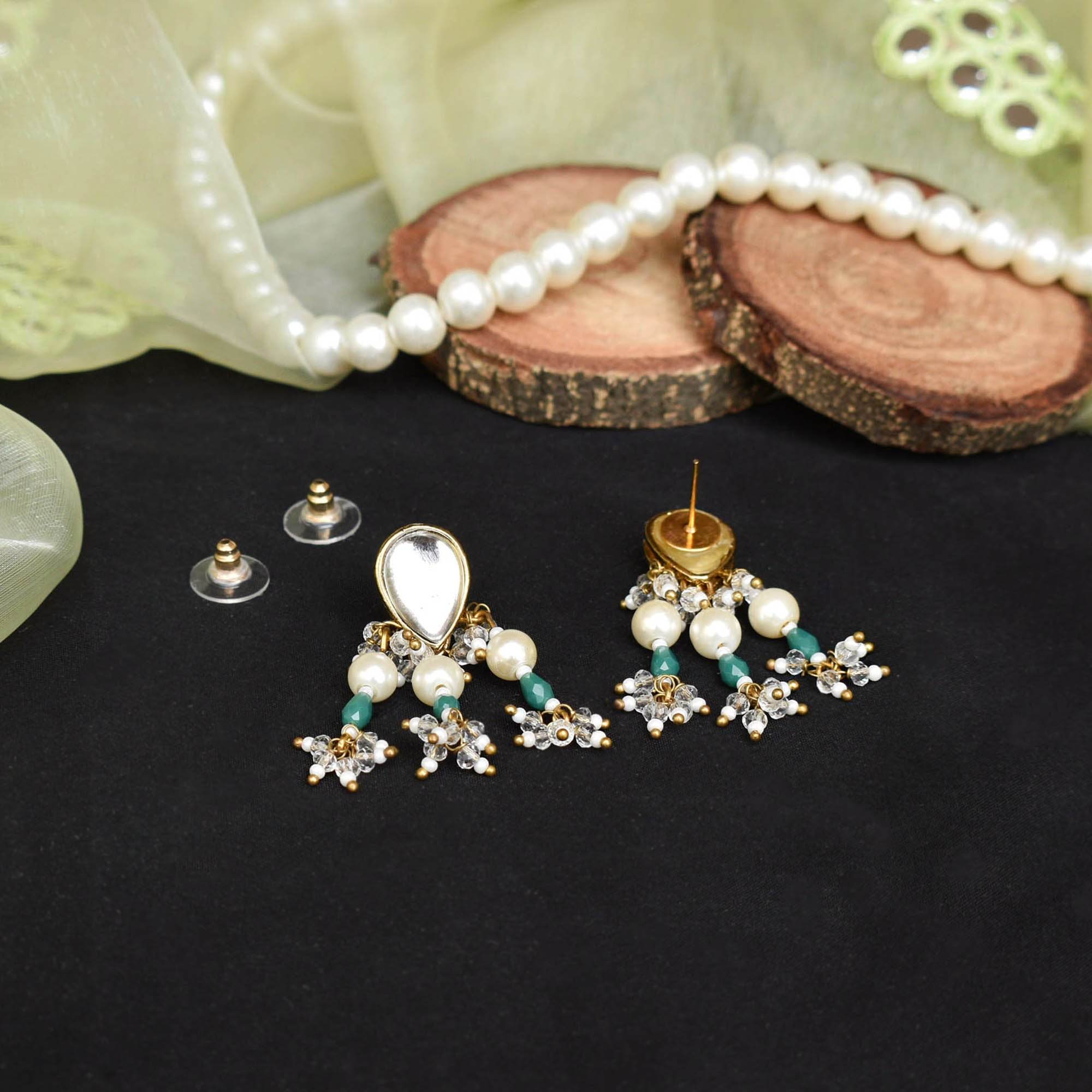 Traditional Kundan earrings in gold-tone, perfect for weddings and festive wear