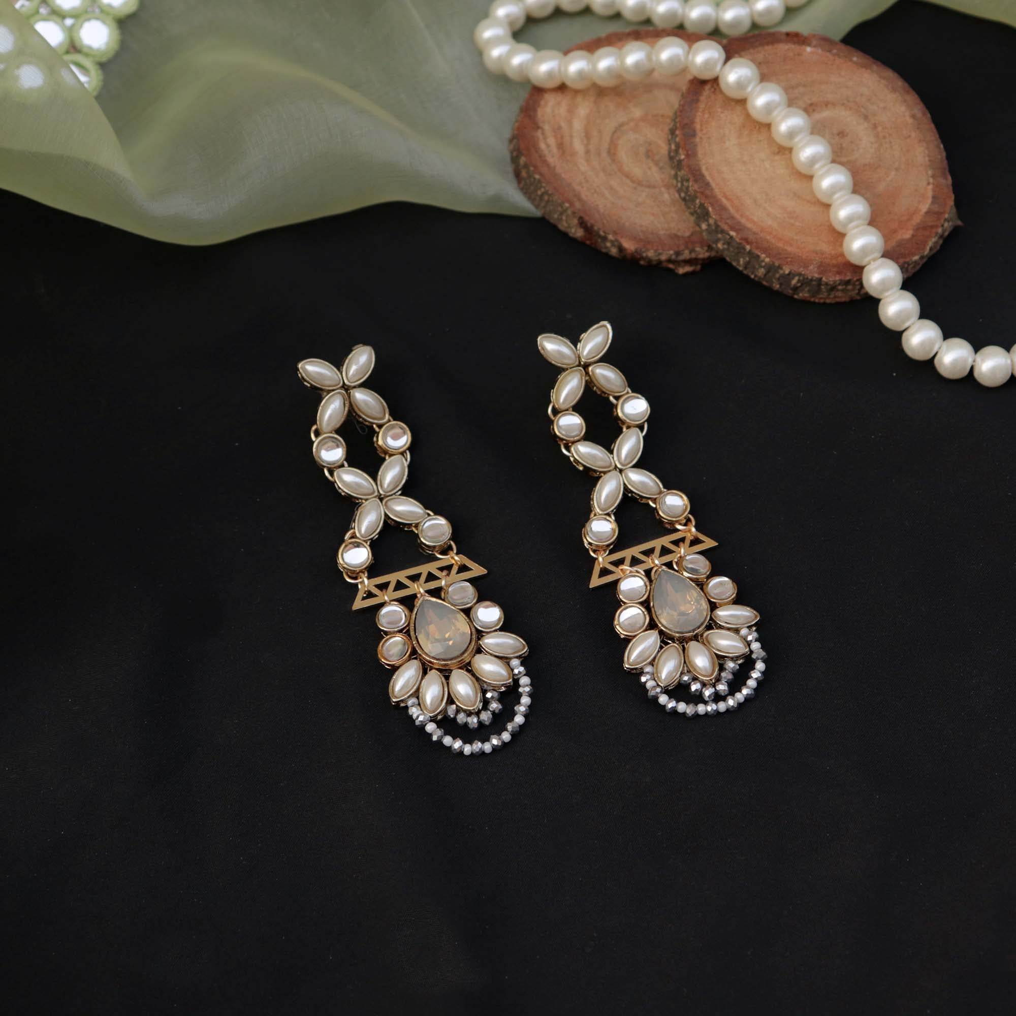 Traditional Kundan earrings in gold-tone, perfect for weddings and festive wear
