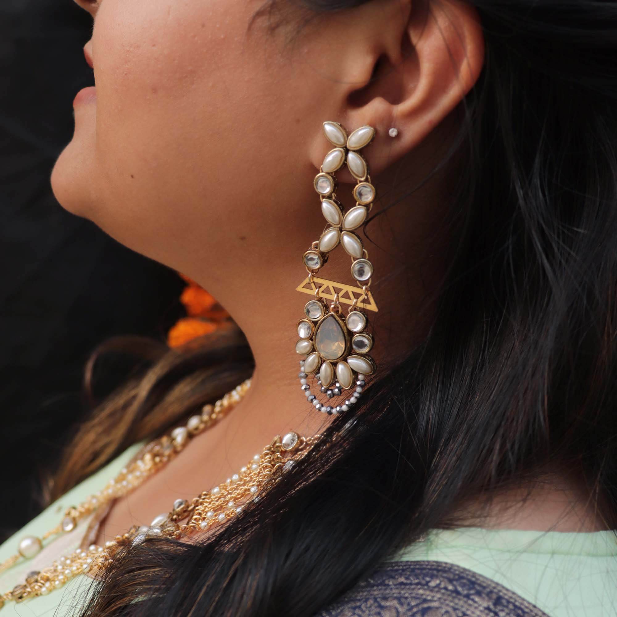 Traditional Kundan earrings in gold-tone, perfect for weddings and festive wear