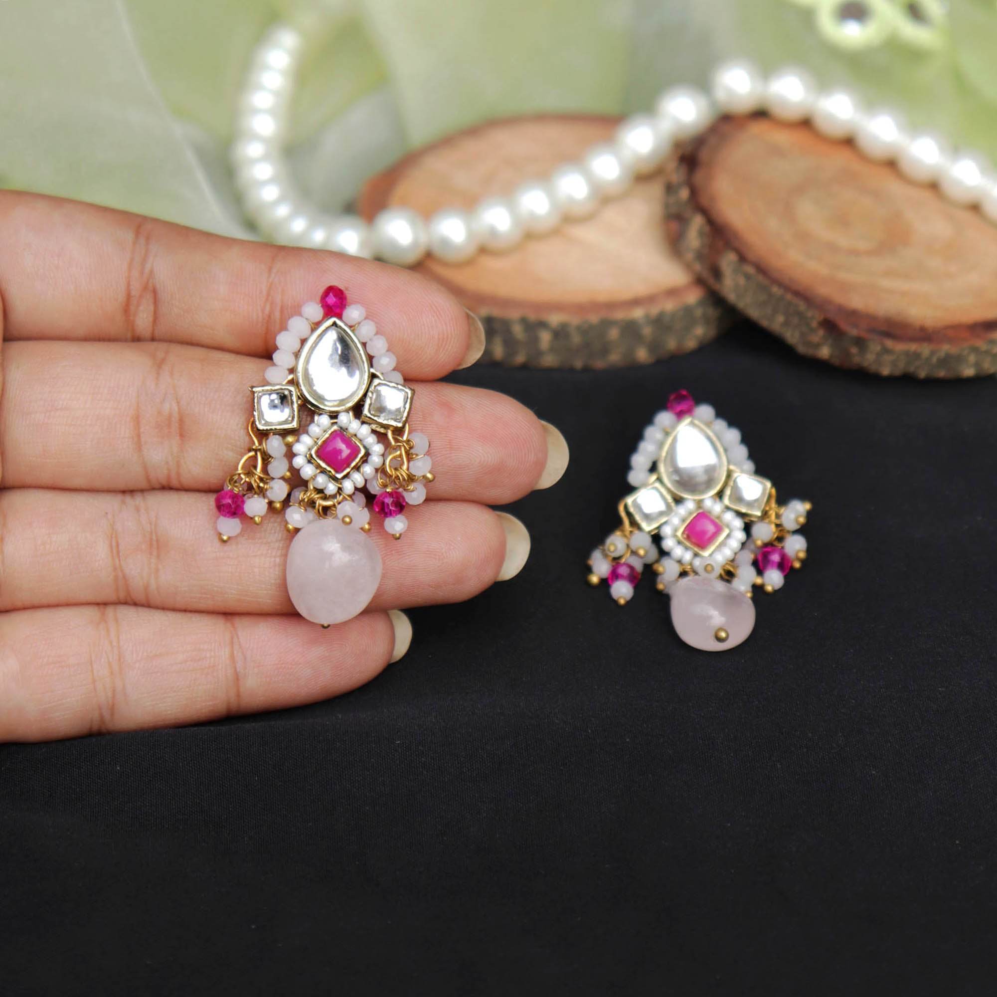 Traditional Kundan earrings in gold-tone, perfect for weddings and festive wear
