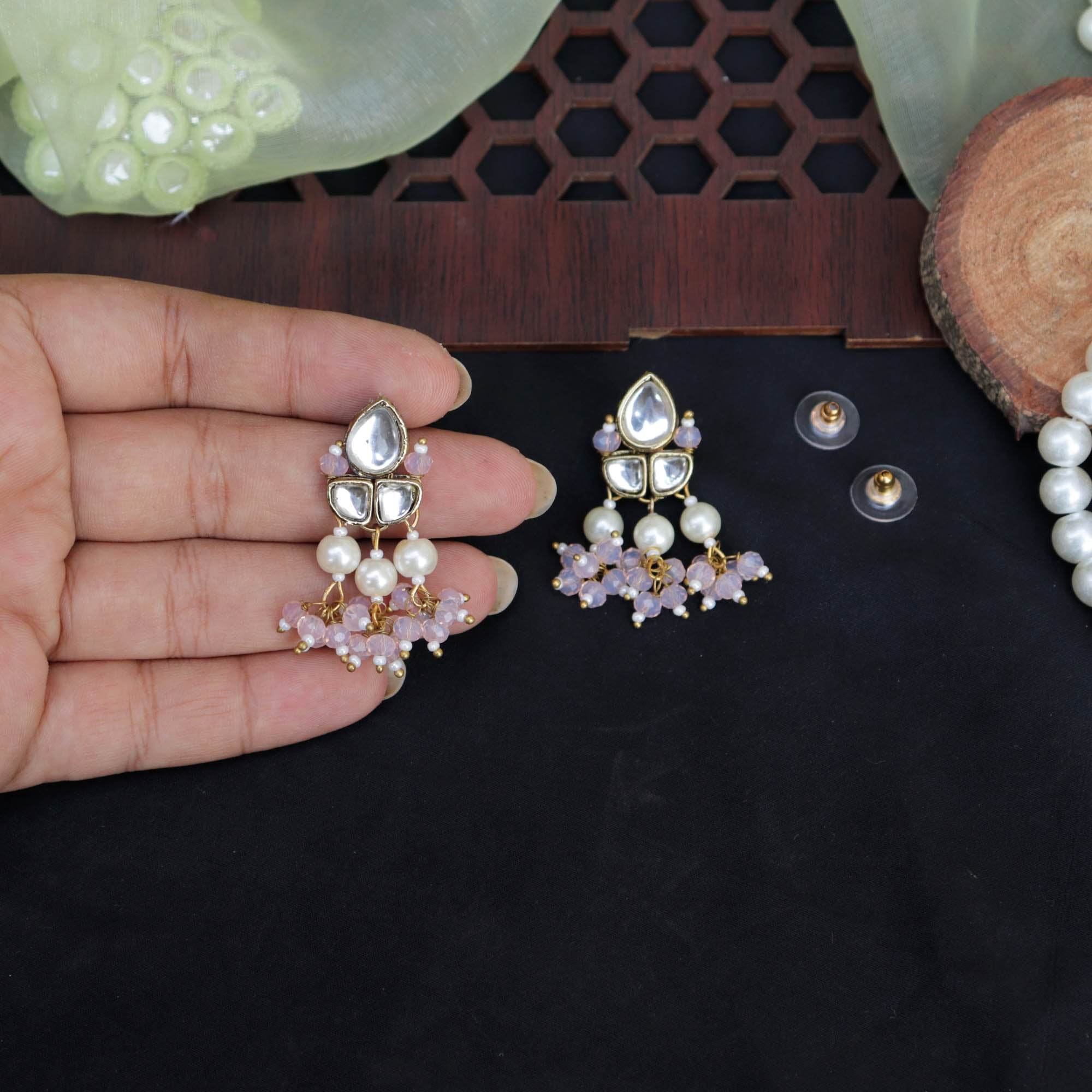 Traditional Kundan earrings in gold-tone, perfect for weddings and festive wear