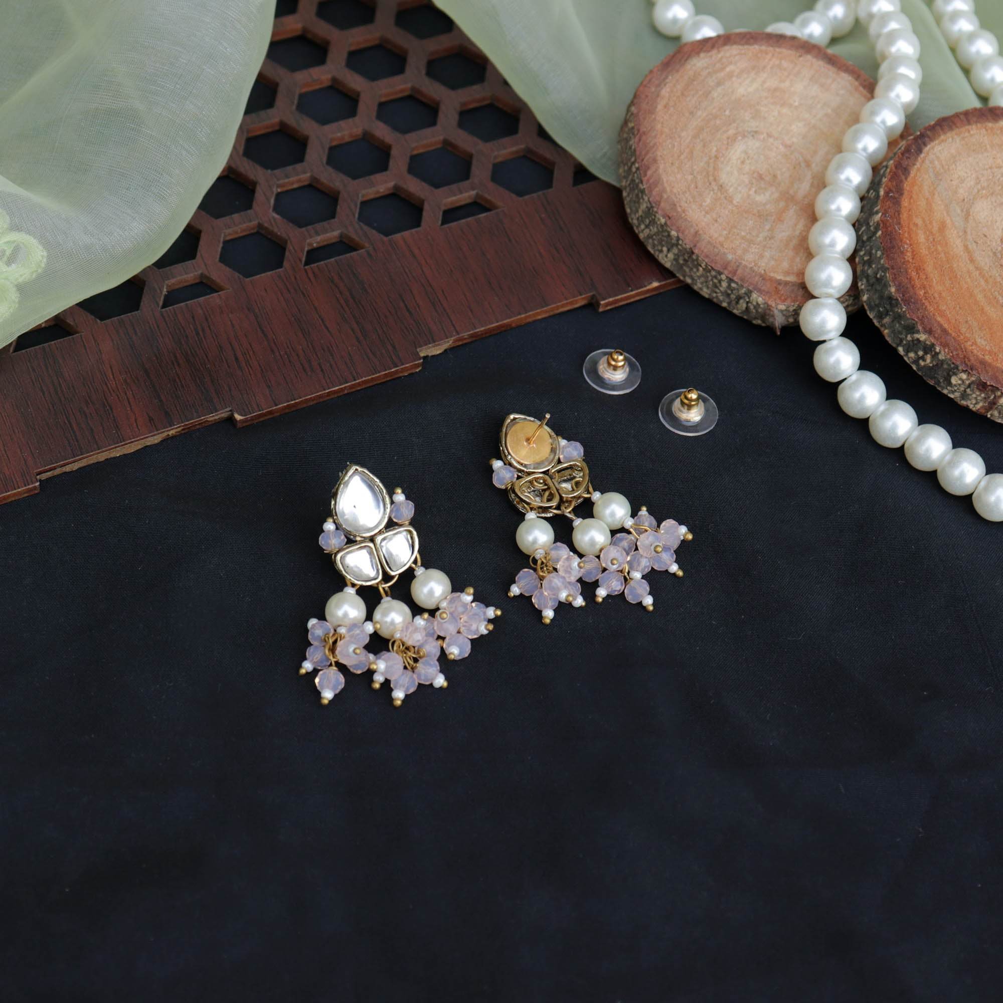 Traditional Kundan earrings in gold-tone, perfect for weddings and festive wear