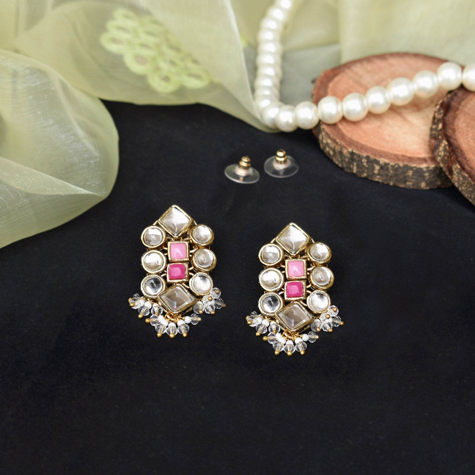 Traditional Kundan earrings in gold-tone, perfect for weddings and festive wear