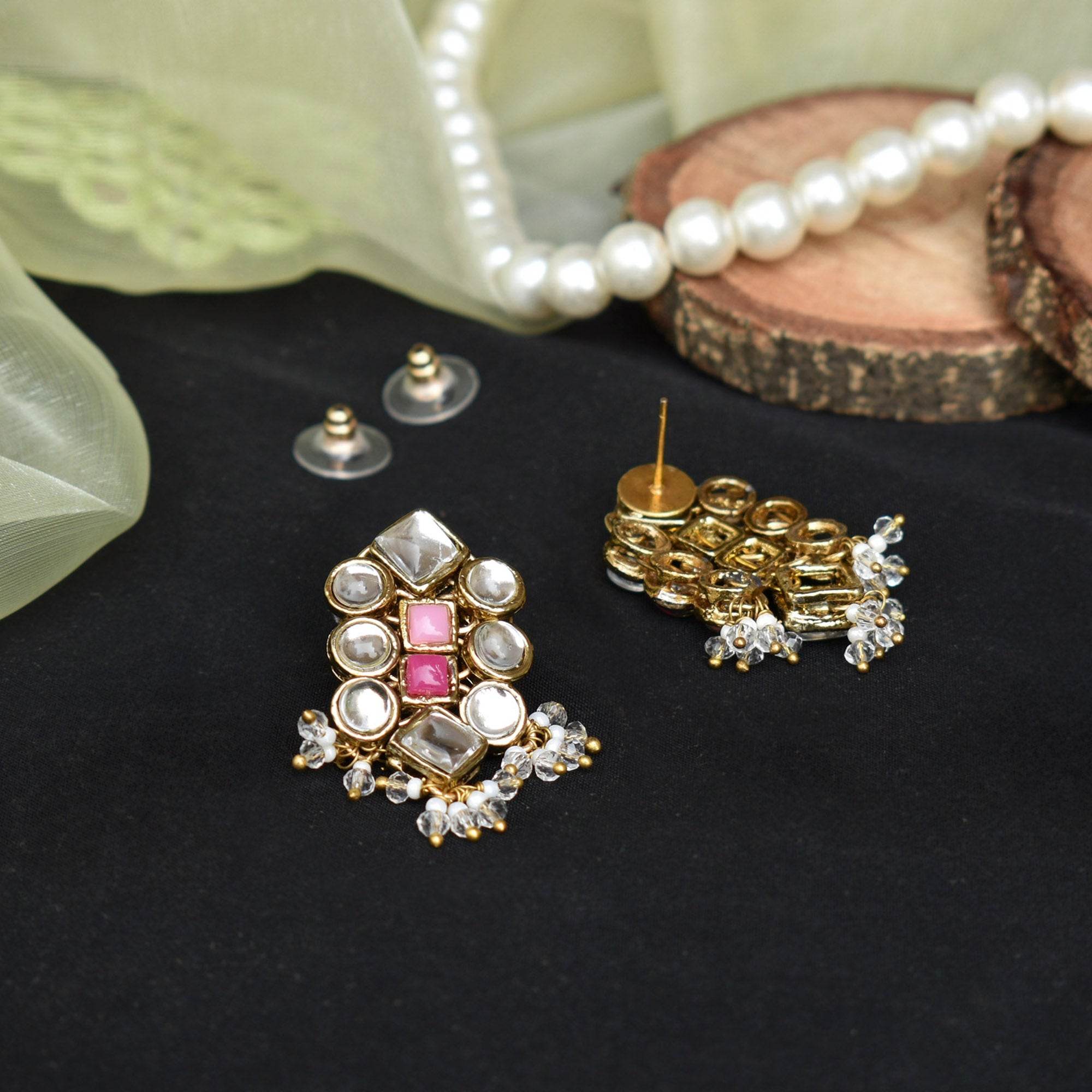 Traditional Kundan earrings in gold-tone, perfect for weddings and festive wear