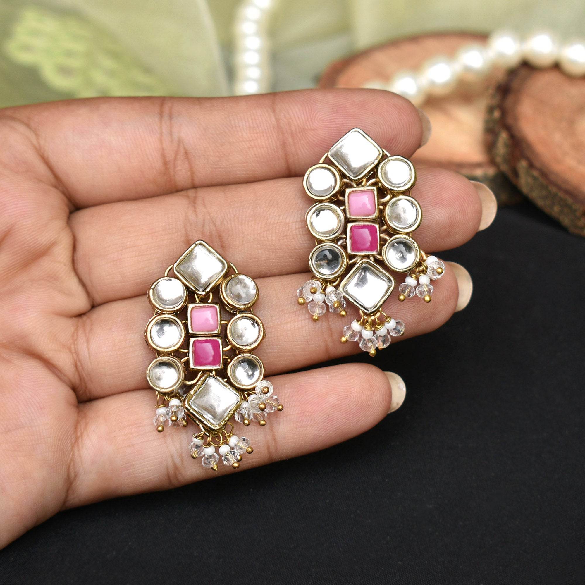 Traditional Kundan earrings in gold-tone, perfect for weddings and festive wear