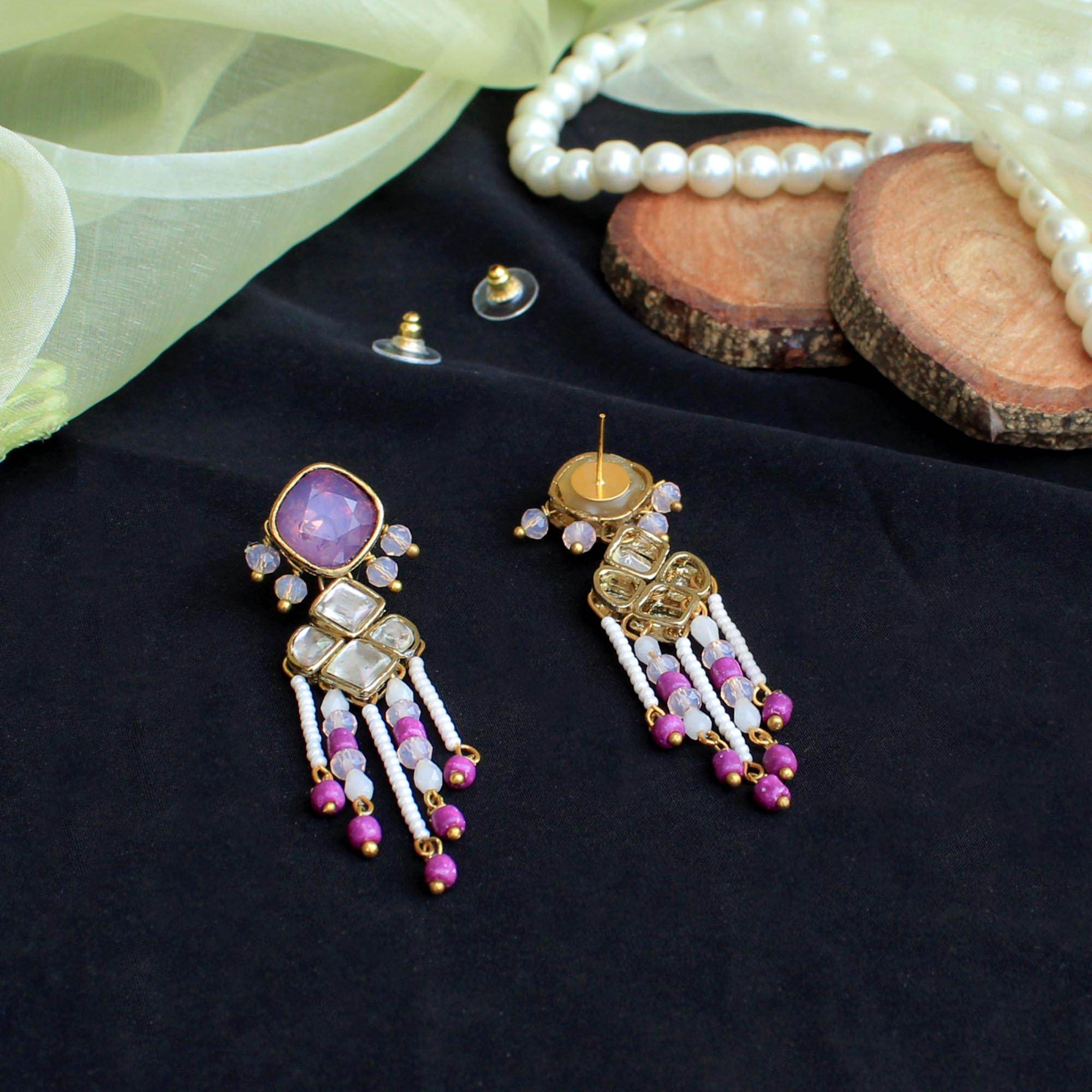 Traditional Kundan earrings in gold-tone, perfect for weddings and festive wear