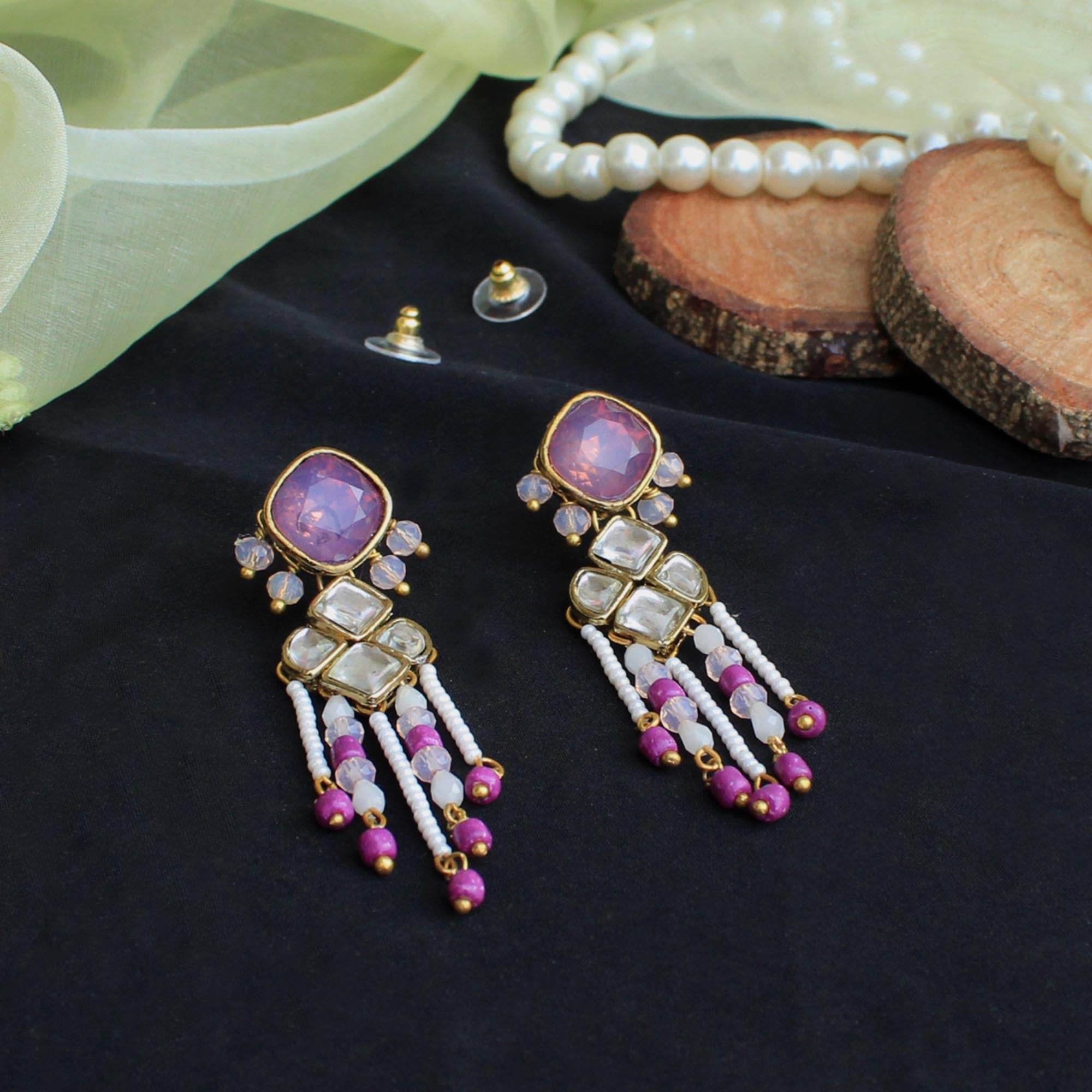 Traditional Kundan earrings in gold-tone, perfect for weddings and festive wear