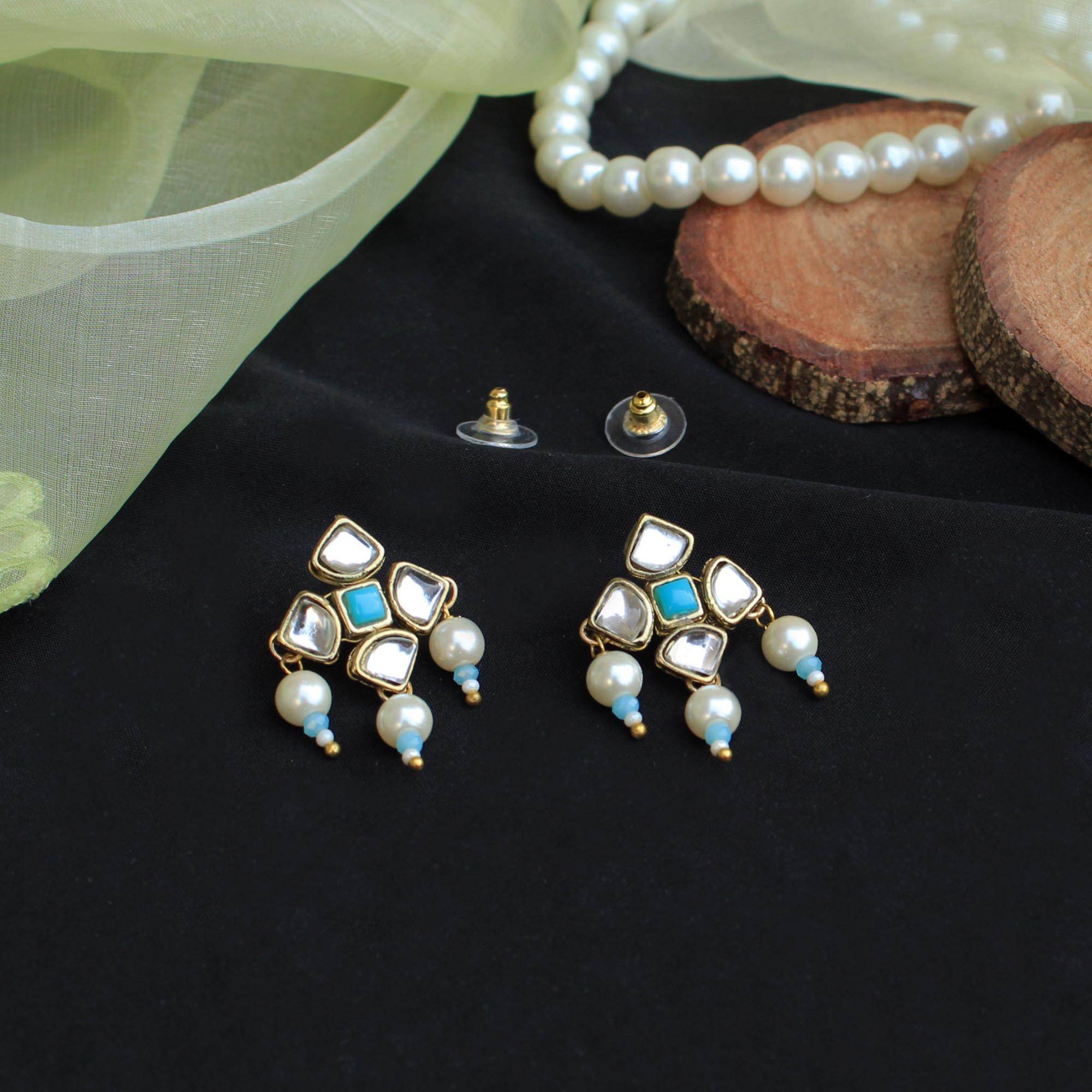 Traditional Kundan earrings in gold-tone, perfect for weddings and festive wear
