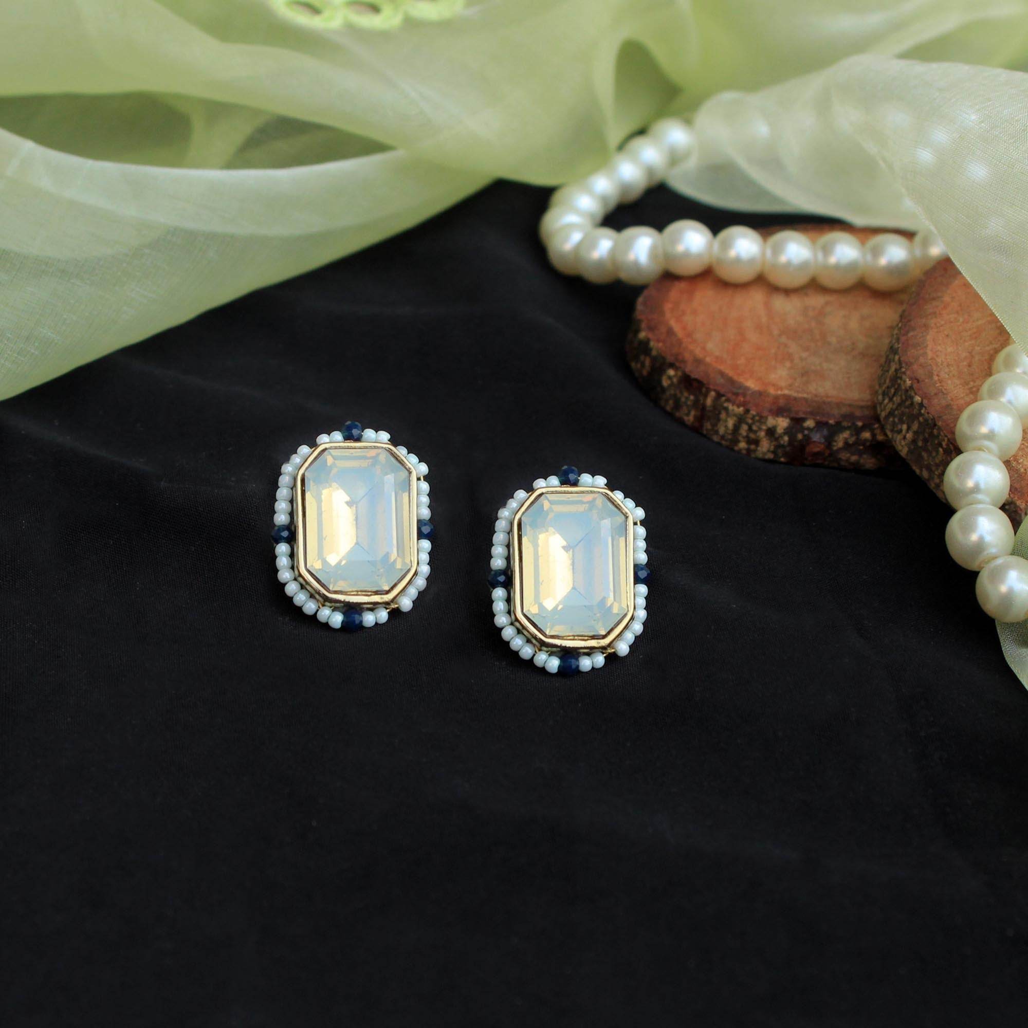Traditional Kundan earrings in gold-tone, perfect for weddings and festive wear