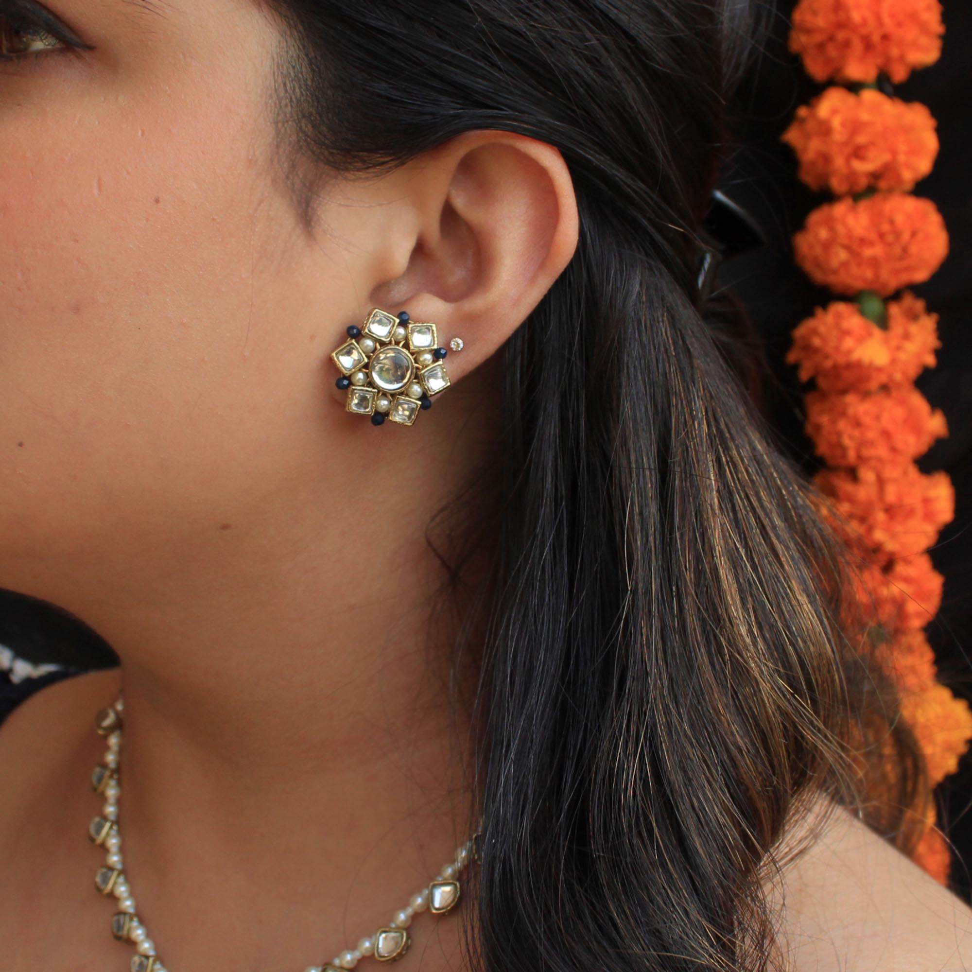 Traditional Kundan earrings in gold-tone, perfect for weddings and festive wear