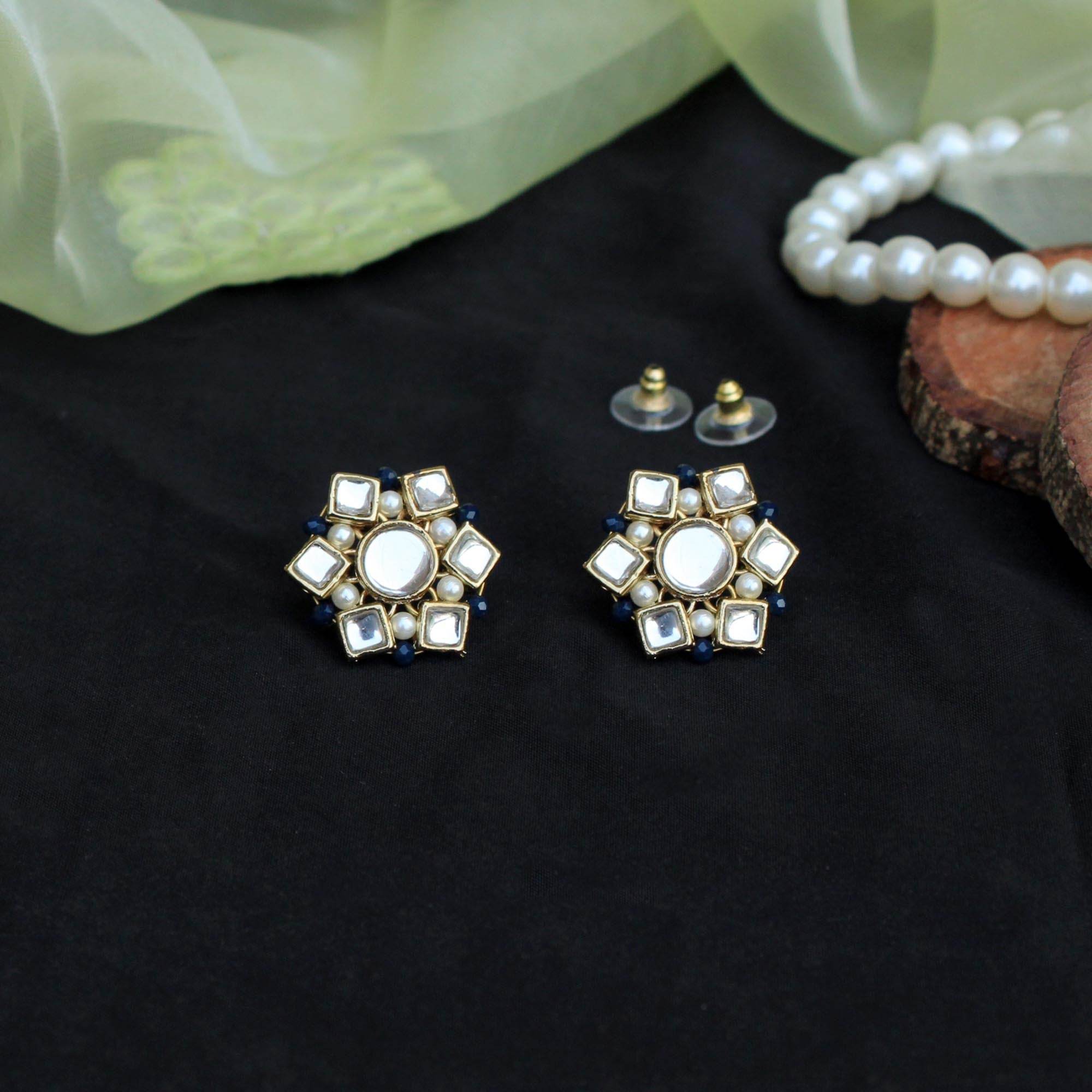 Traditional Kundan earrings in gold-tone, perfect for weddings and festive wear