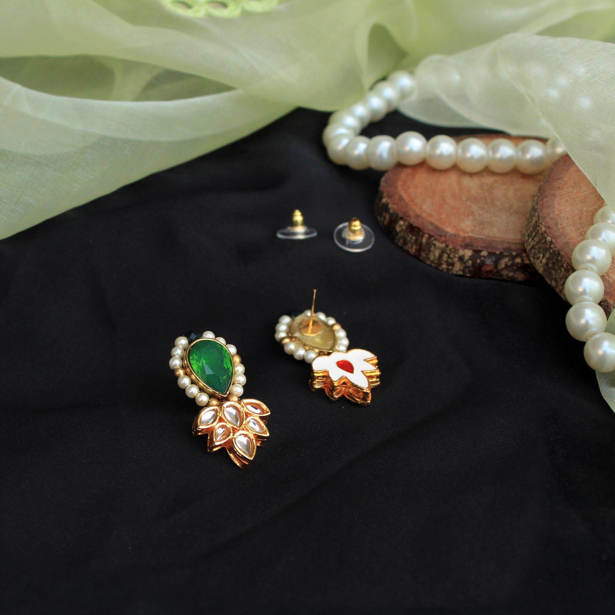 Traditional Kundan earrings in gold-tone, perfect for weddings and festive wear