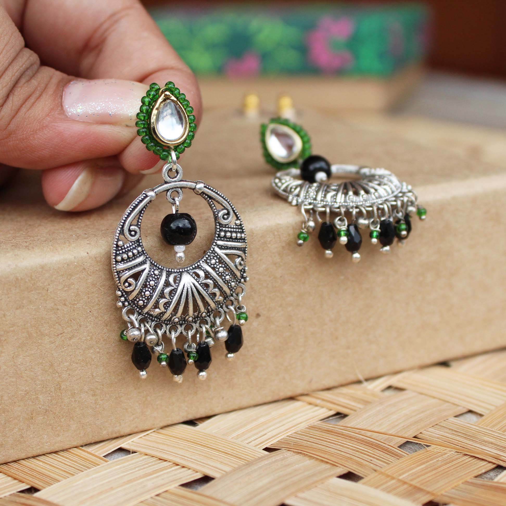 Traditional Kundan earrings in gold-tone, perfect for weddings and festive wear