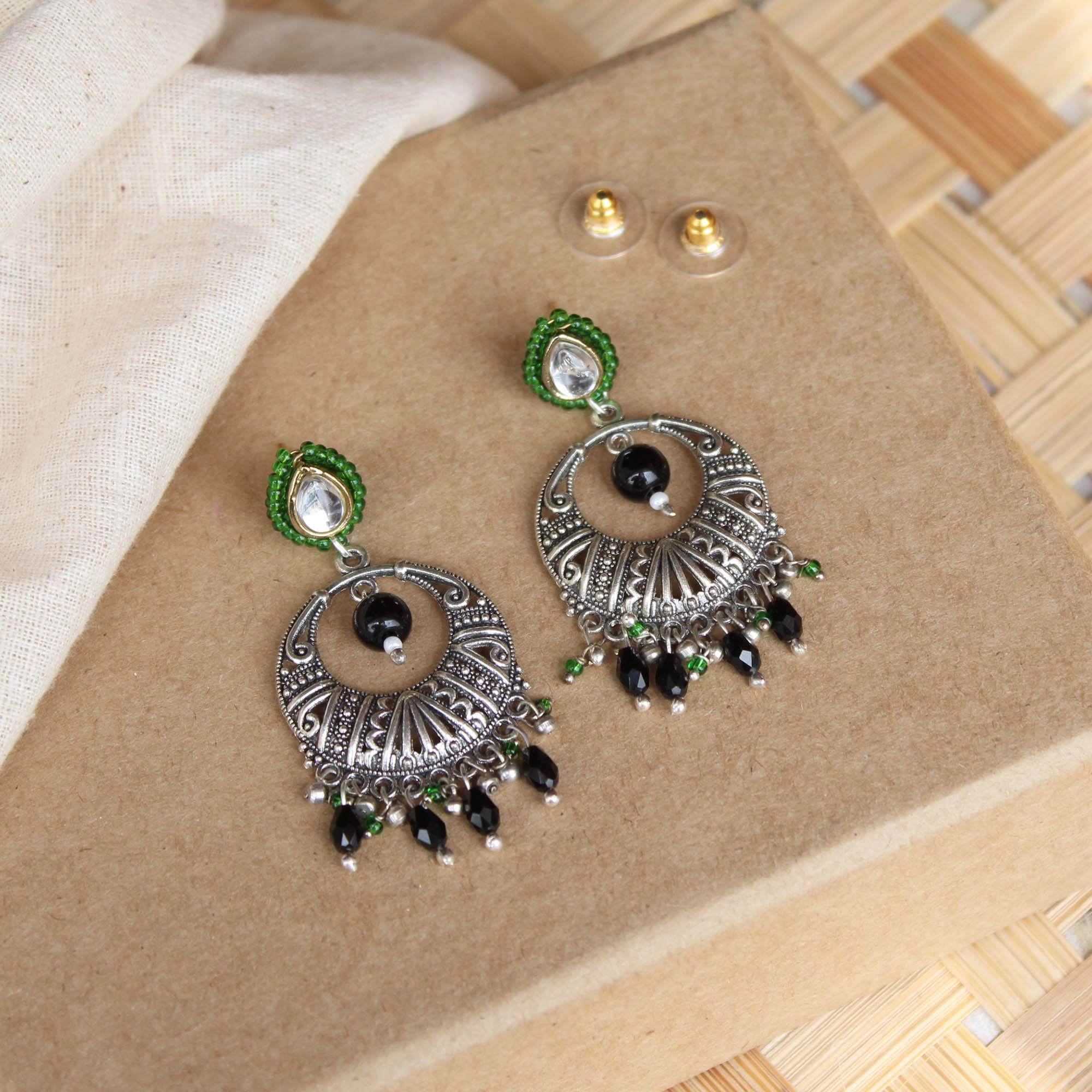 Traditional Kundan earrings in gold-tone, perfect for weddings and festive wear