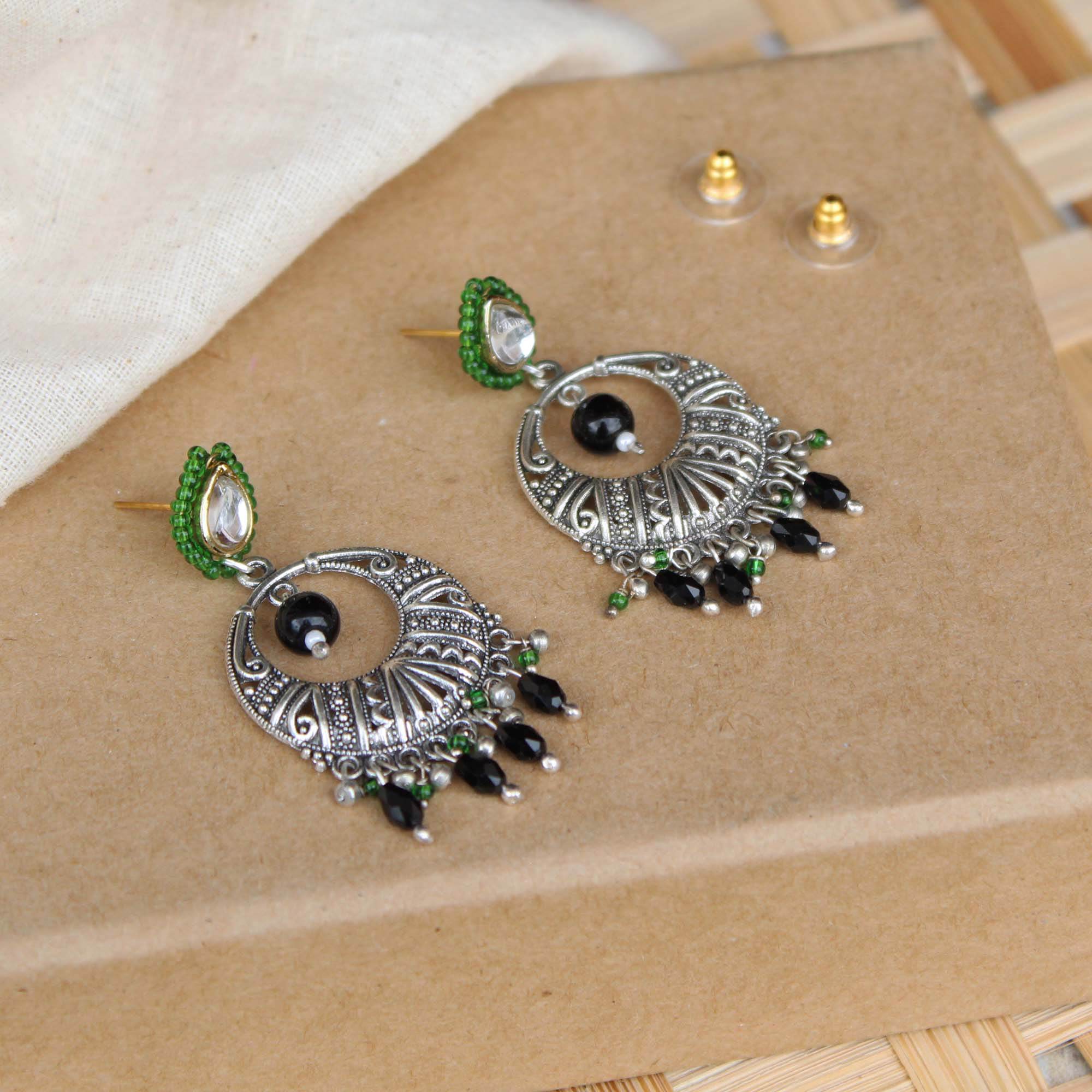 Traditional Kundan earrings in gold-tone, perfect for weddings and festive wear