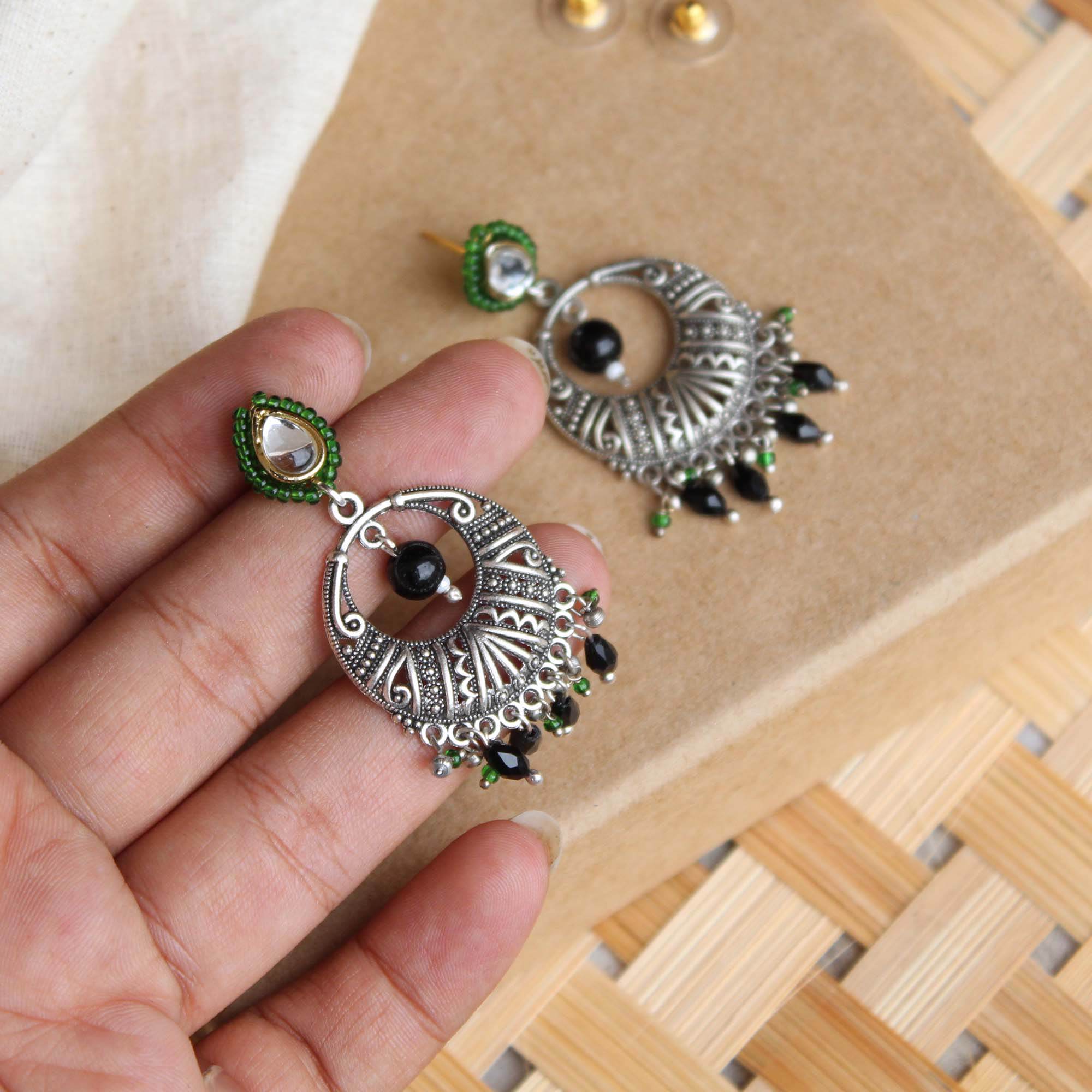 Traditional Kundan earrings in gold-tone, perfect for weddings and festive wear