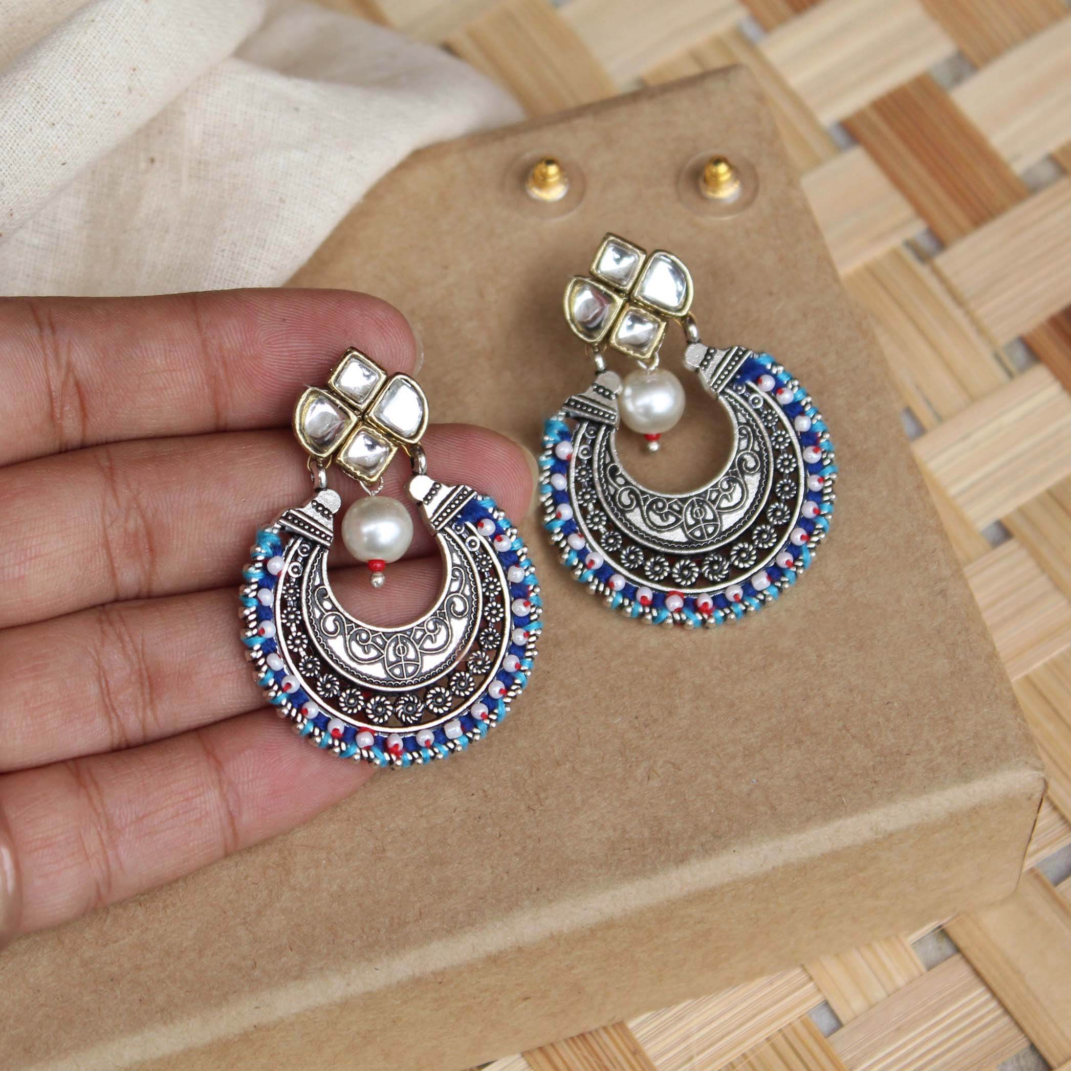 Traditional Kundan earrings in gold-tone, perfect for weddings and festive wear