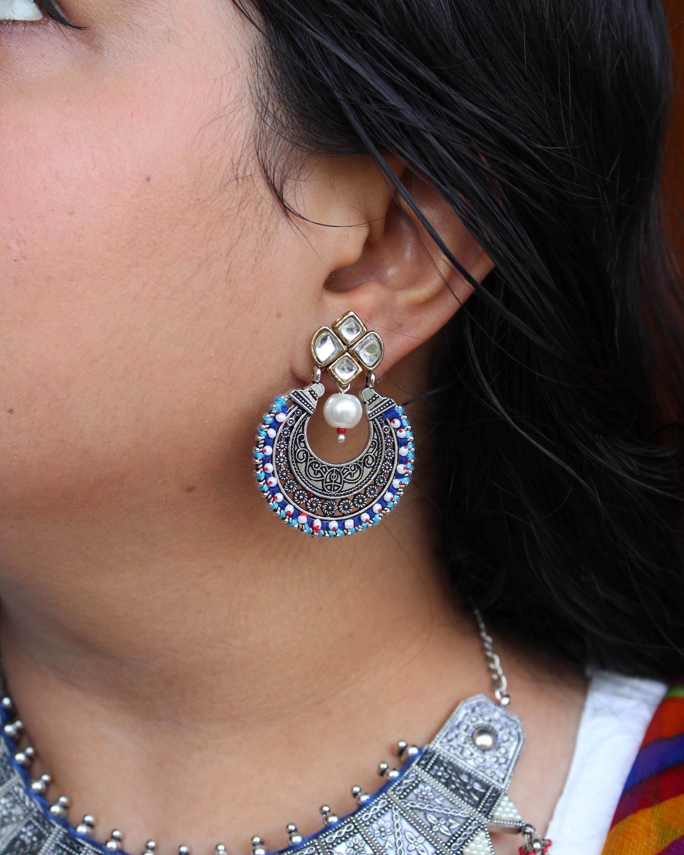 Traditional Kundan earrings in gold-tone, perfect for weddings and festive wear