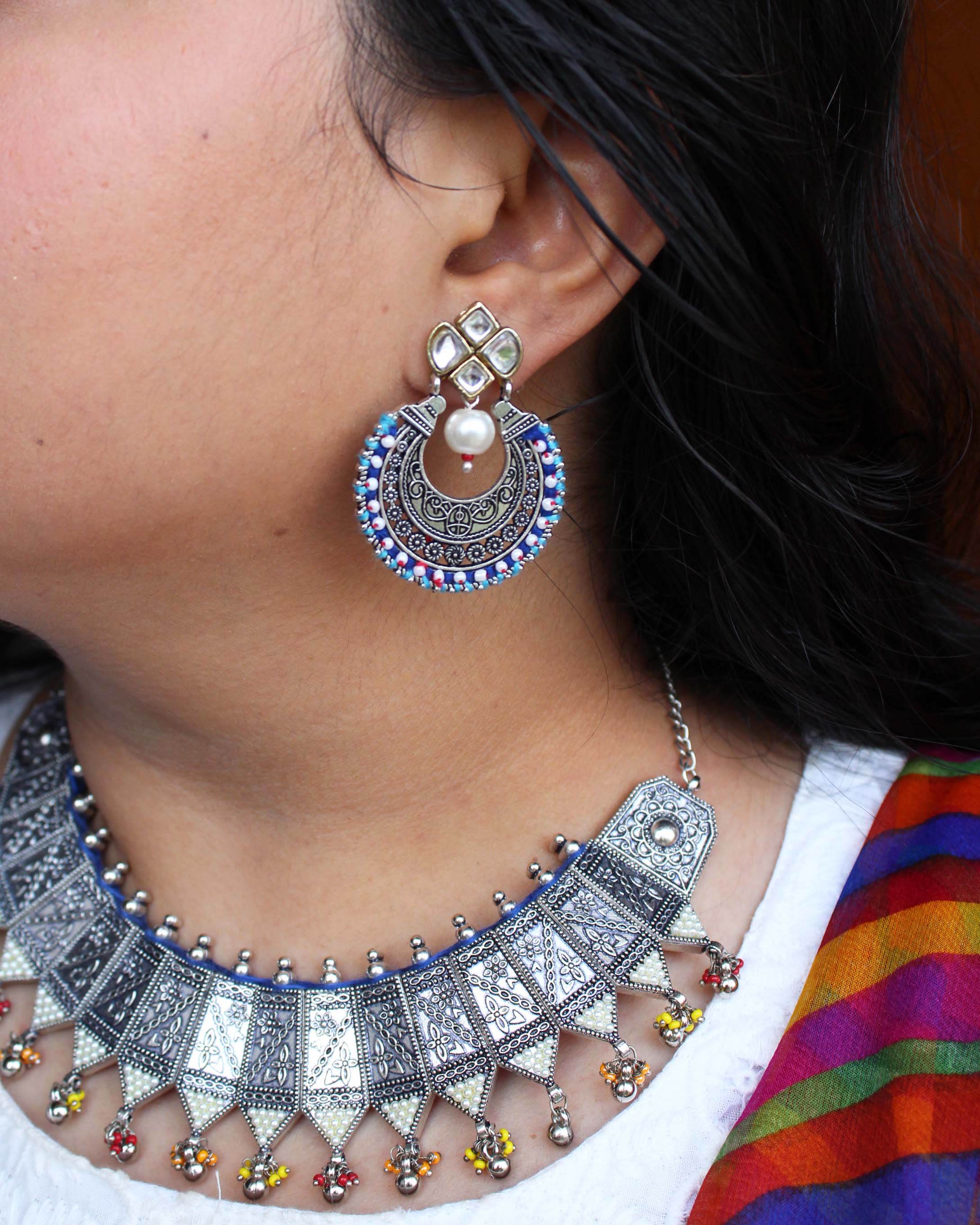 Traditional Kundan earrings in gold-tone, perfect for weddings and festive wear