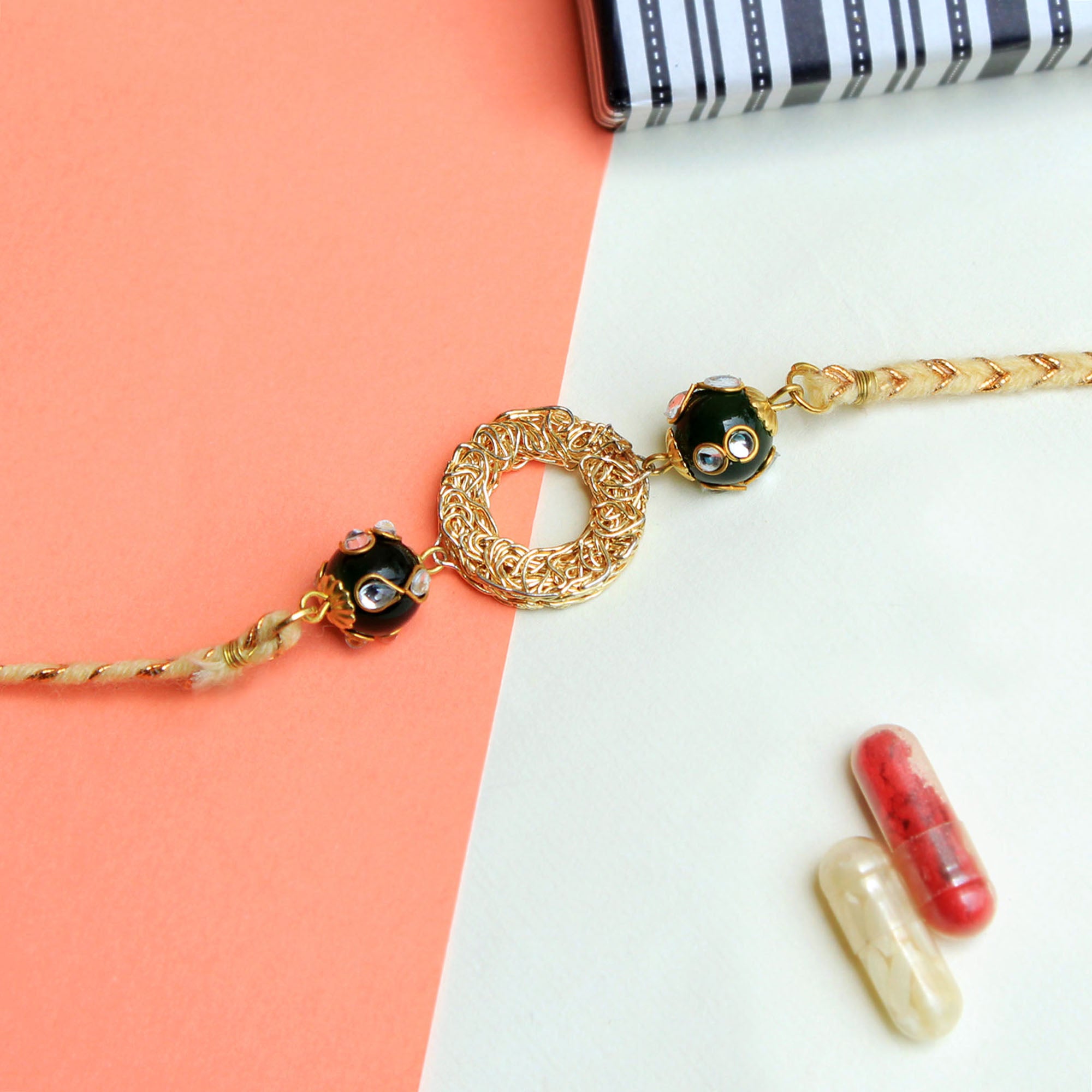 Green Bead & Round Mesh Rakhi