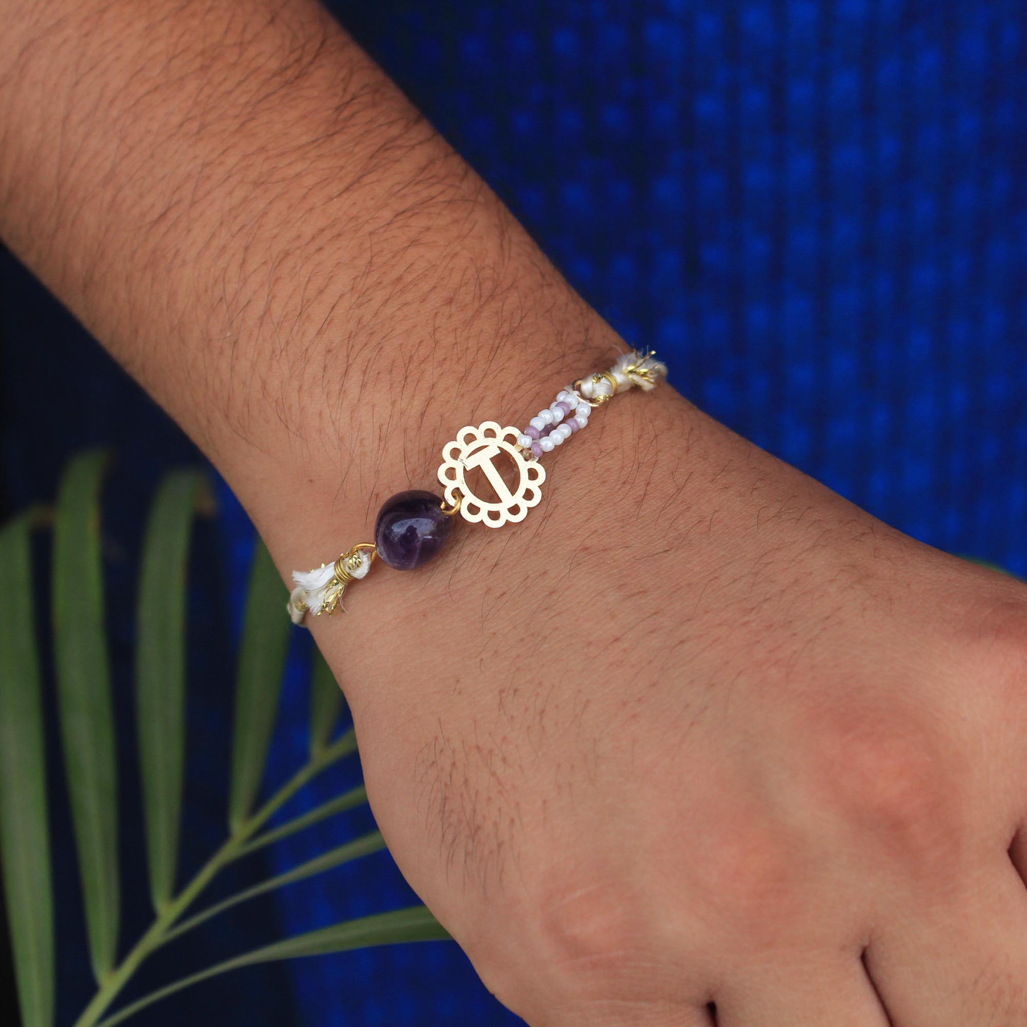 BeAbhika Gold Tone Rakhi Amaethyst Stone Purple Color Beads Lightweight Easy To Tie Rakhi Available At Best Price In India Online COD Available Send Rakhi To Brother Small Brother Big Brother Younger Brother Send Rakhi Abroad With Roli Chawal Capsules Designer Unqiue Famous