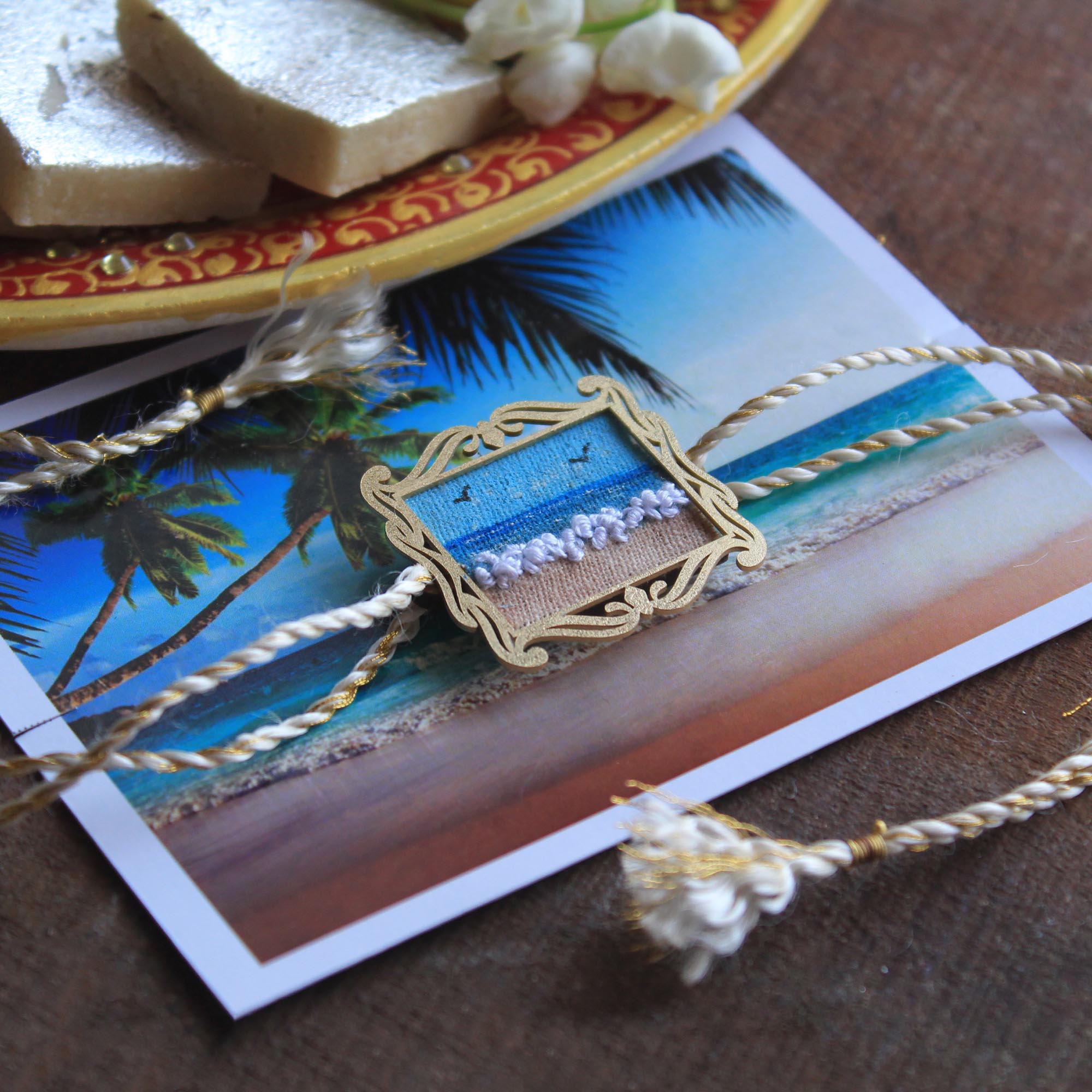 BeAbhika Hand Embroidered Beach Waves Beach Lover Bro Rakhi With Fridge Magnet Designer Unqiue Famous Rakhi Lightweight Easy To Tie Rakhi Available At Best Price In India Online COD Available Send Rakhi To Brother Small Brother Big Brother Younger Brother Send Rakhi Abroad With Roli Chawal Capsules