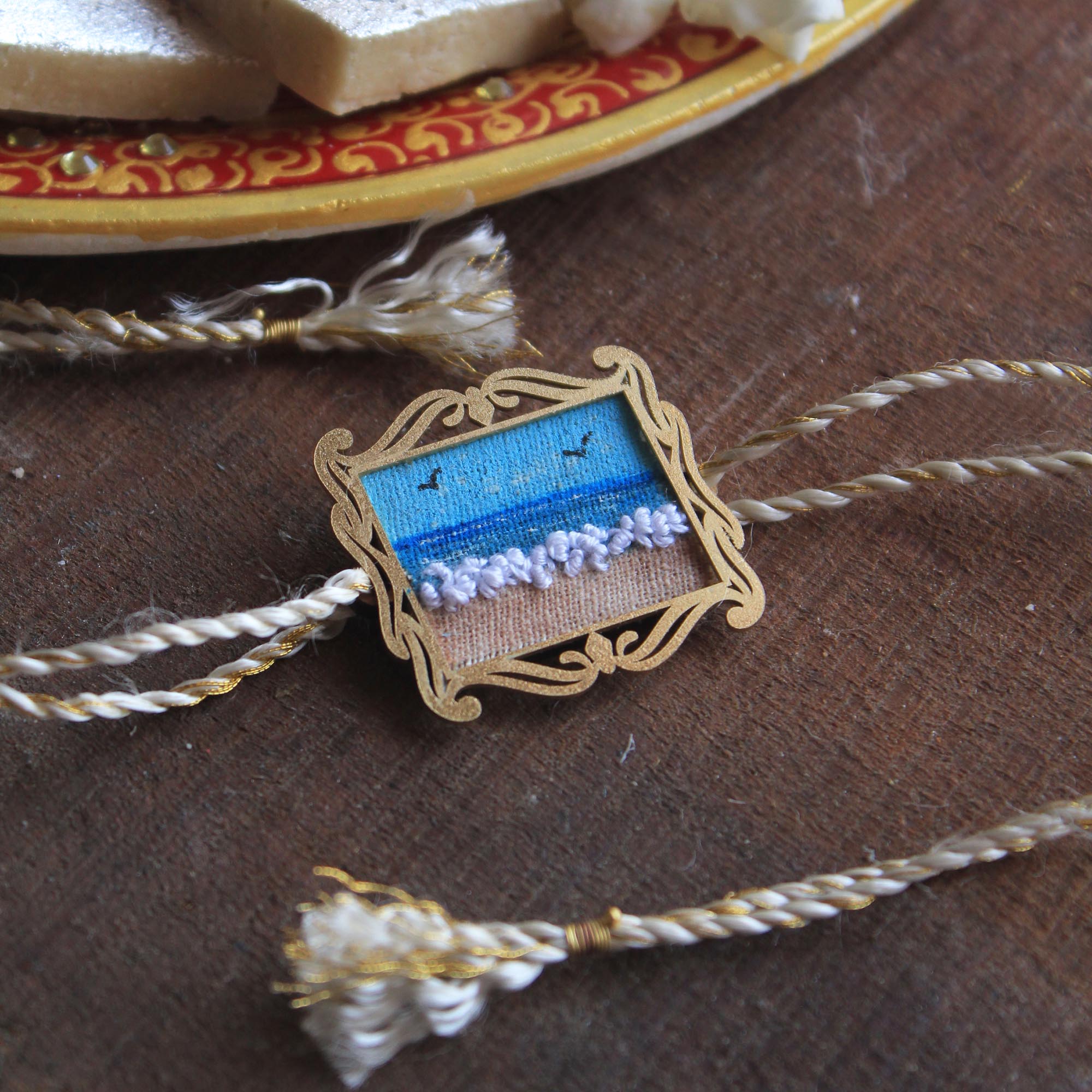 BeAbhika Hand Embroidered Beach Waves Beach Lover Bro Rakhi With Fridge Magnet Designer Unqiue Famous Rakhi Lightweight Easy To Tie Rakhi Available At Best Price In India Online COD Available Send Rakhi To Brother Small Brother Big Brother Younger Brother Send Rakhi Abroad With Roli Chawal Capsules