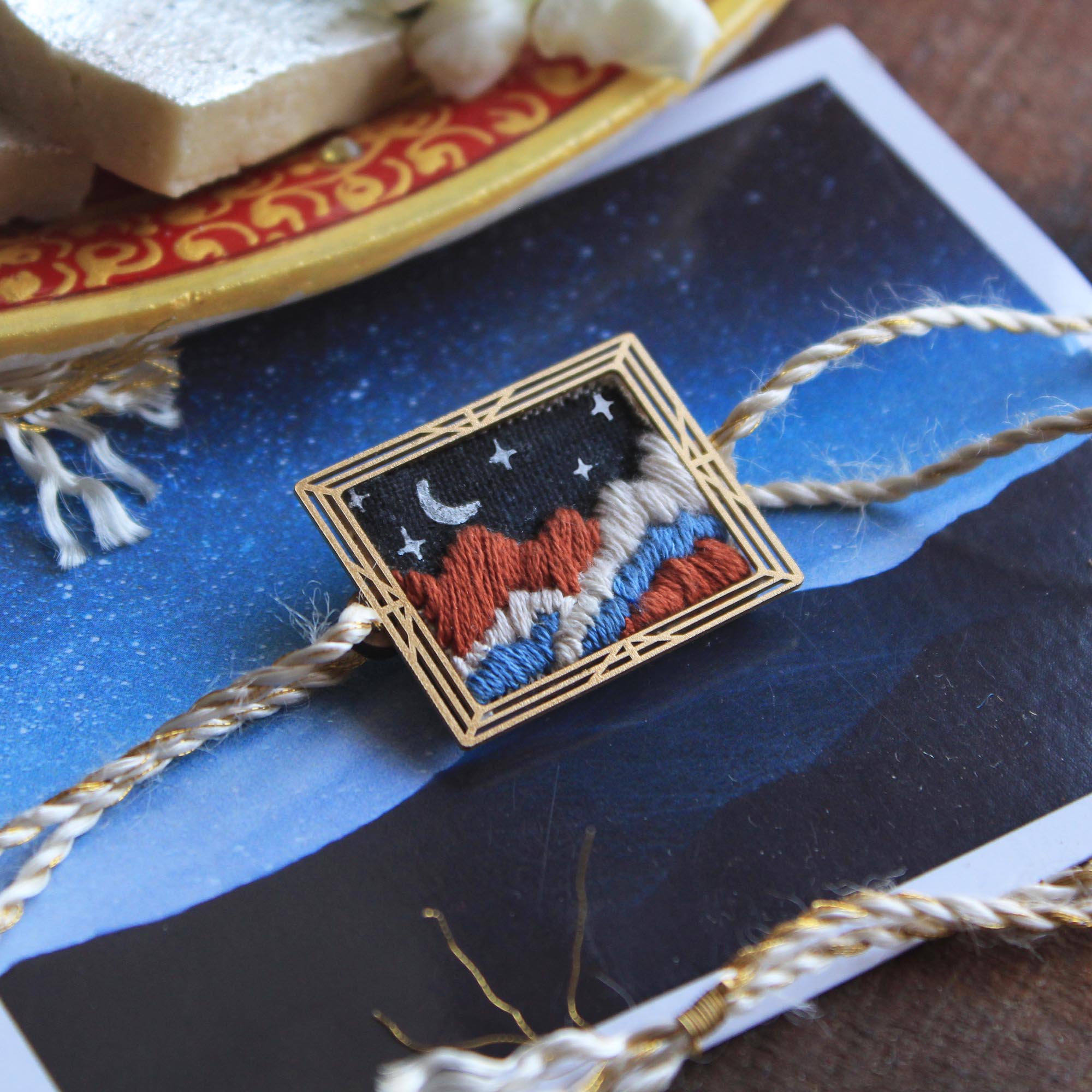 BeAbhika Hand Embroidered Star Gazing Astronaut Bro Moon Rakhi With Fridge Magnet Designer Unqiue Famous Rakhi Lightweight Easy To Tie Rakhi Available At Best Price In India Online COD Available Send Rakhi To Brother Small Brother Big Brother Younger Brother Send Rakhi Abroad With Roli Chawal Capsules