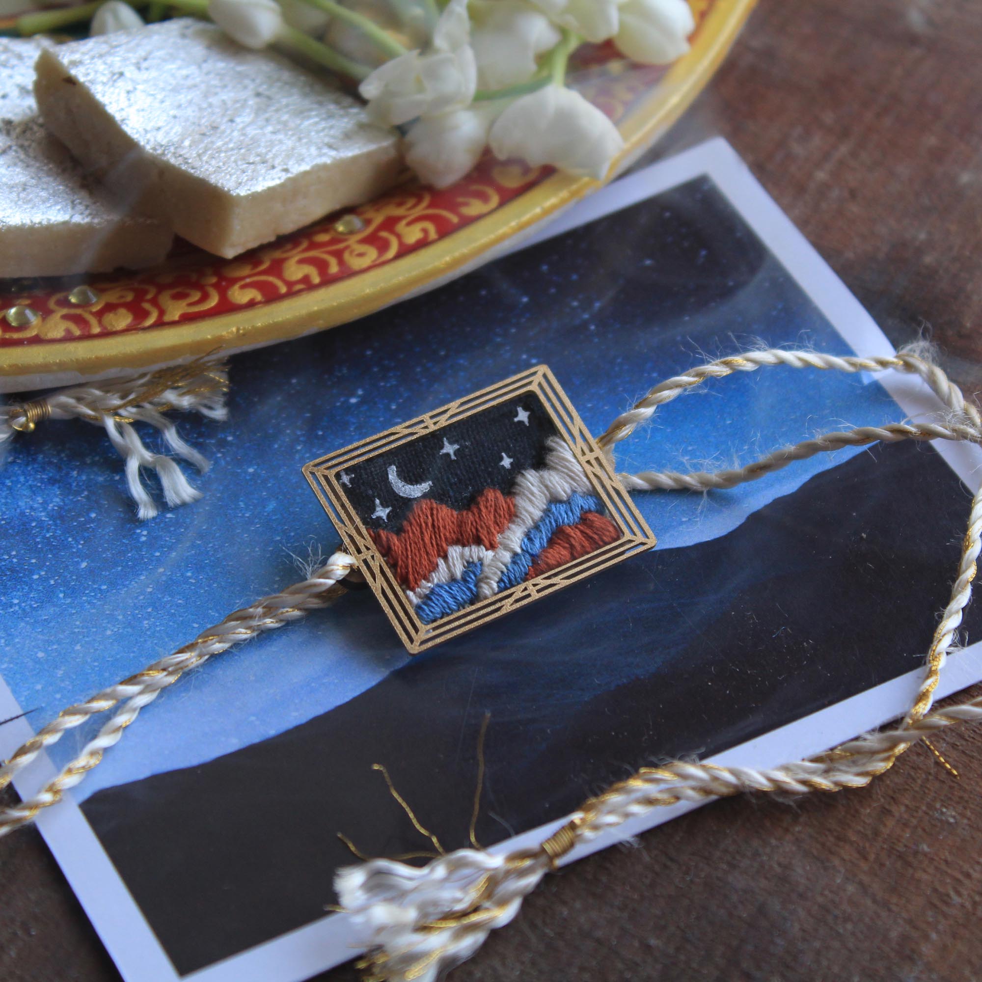 BeAbhika Hand Embroidered Star Gazing Astronaut Bro Moon Rakhi With Fridge Magnet Designer Unqiue Famous Rakhi Lightweight Easy To Tie Rakhi Available At Best Price In India Online COD Available Send Rakhi To Brother Small Brother Big Brother Younger Brother Send Rakhi Abroad With Roli Chawal Capsules