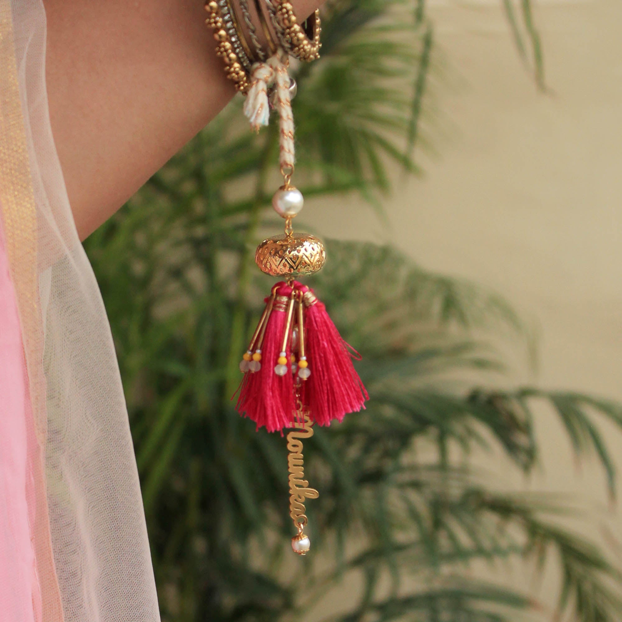 BeAbhika Gold Tone Red Tassel PersonaliSend Bhabhi Name Lumba Rakhi For Sister In Law Designer Unique Bhabhi Rakhi Lumba Available In India Best Price Online Send Rakhi To Bhai Brother Hanging Lumba With Thread CustomiSend Name Bhabhi Lumba