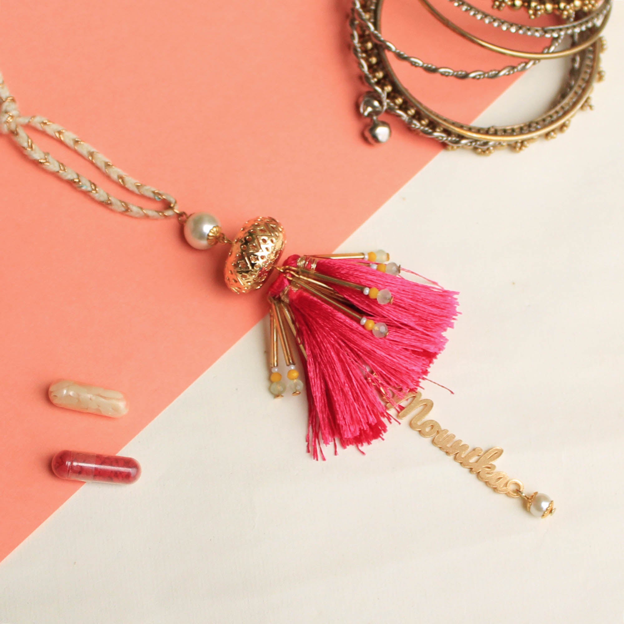 BeAbhika Gold Tone Red Tassel PersonaliSend Bhabhi Name Lumba Rakhi For Sister In Law Designer Unique Bhabhi Rakhi Lumba Available In India Best Price Online Send Rakhi To Bhai Brother Hanging Lumba With Thread CustomiSend Name Bhabhi Lumba