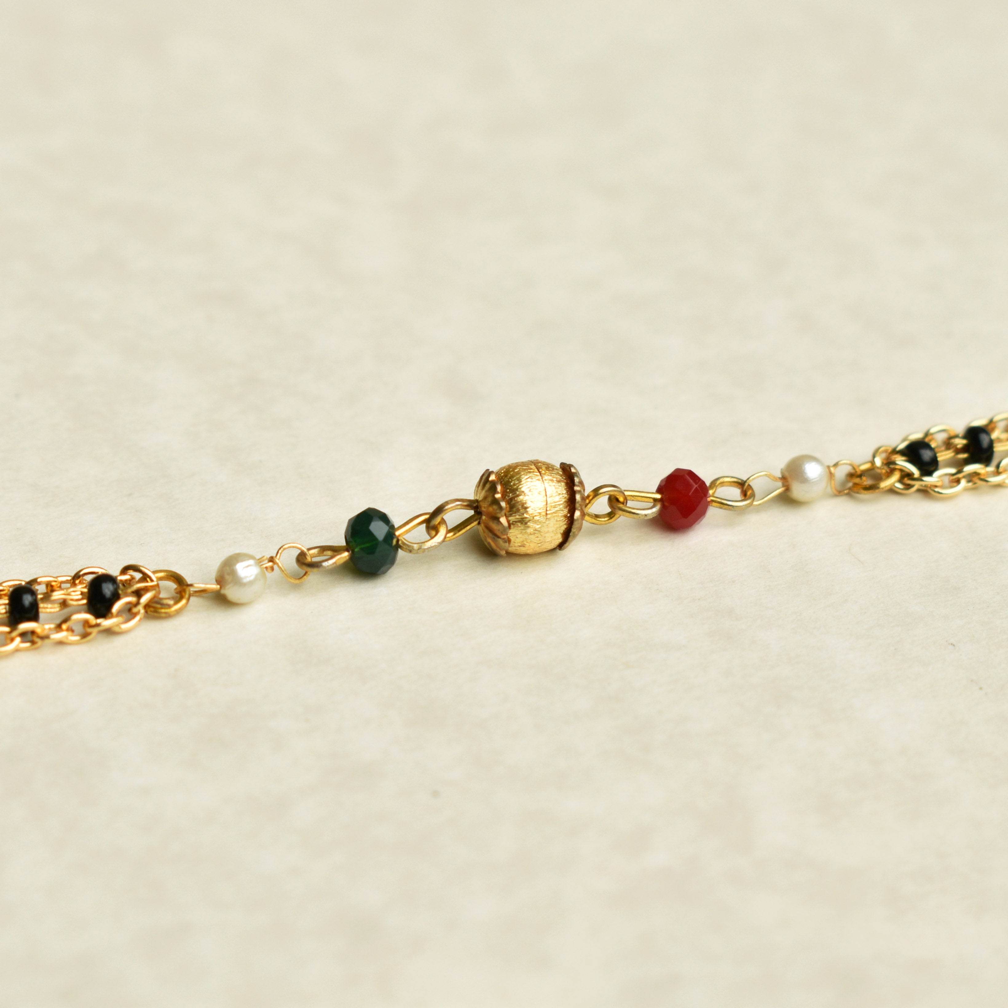 black, red, golden beads mangalsutra bracelet