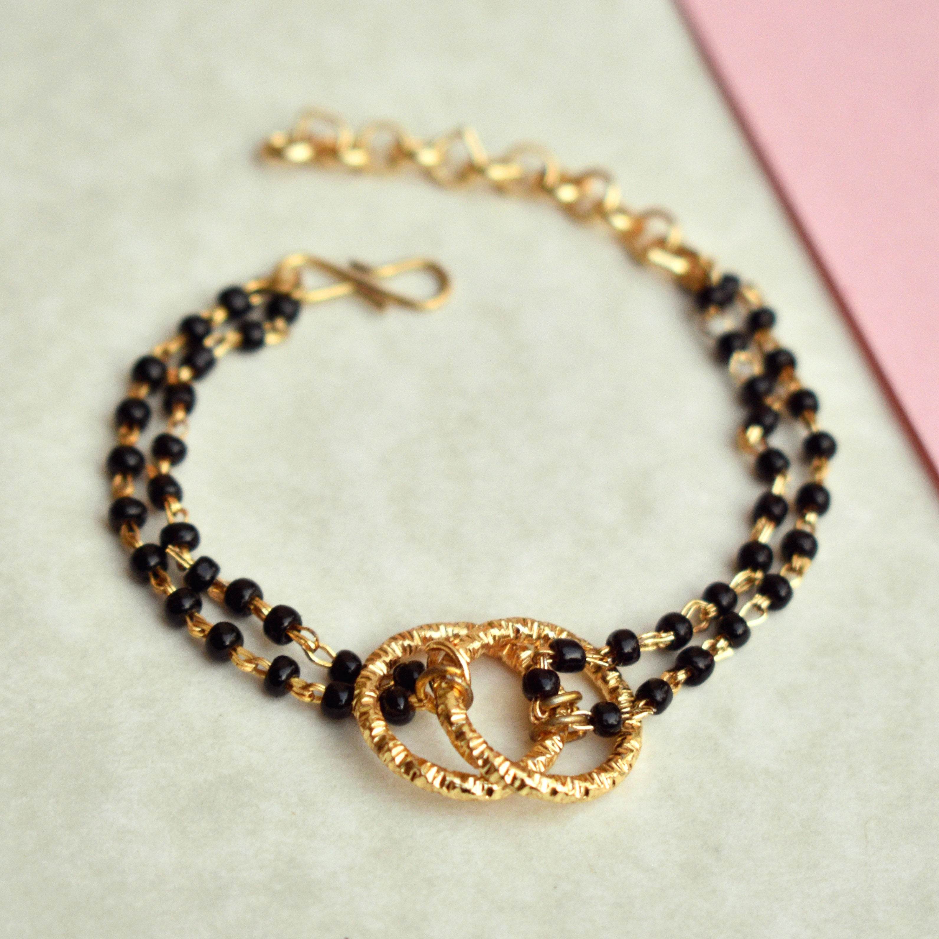 black beads mangalsutra bracelet Beabhika Black Color Bracelet Mangalsutra Bracelet Traditional Bracelet Modern Mangalsutra Bracelet Newly Wed Jewelry New Bride Gift Bride To Be Jewelry 1st Wedding Anniversay Gift For Wife Karvachauth Gift Online Cash On Delivery
