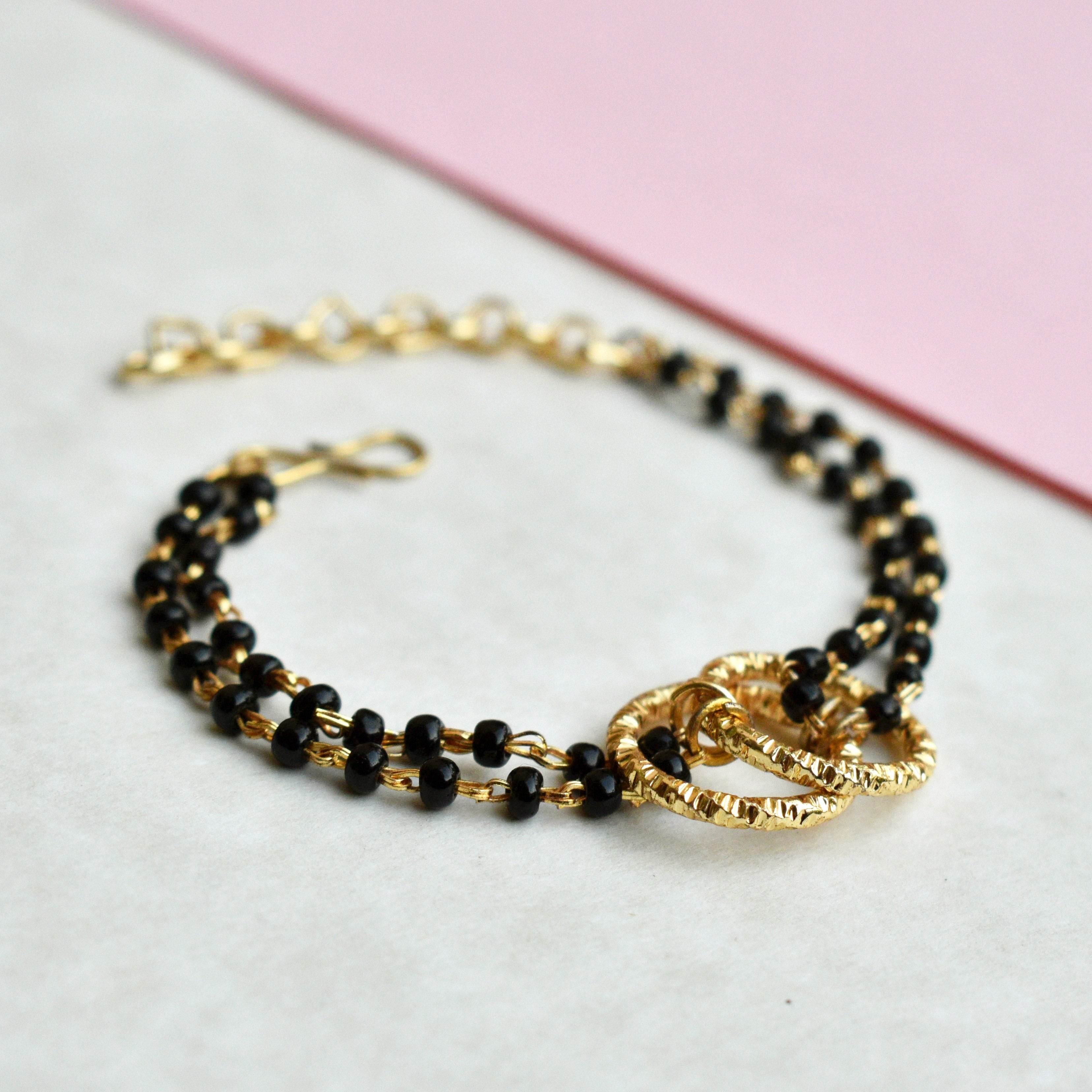 black beads mangalsutra bracelet Beabhika Black Color Bracelet Mangalsutra Bracelet Traditional Bracelet Modern Mangalsutra Bracelet Newly Wed Jewelry New Bride Gift Bride To Be Jewelry 1st Wedding Anniversay Gift For Wife Karvachauth Gift Online Cash On Delivery