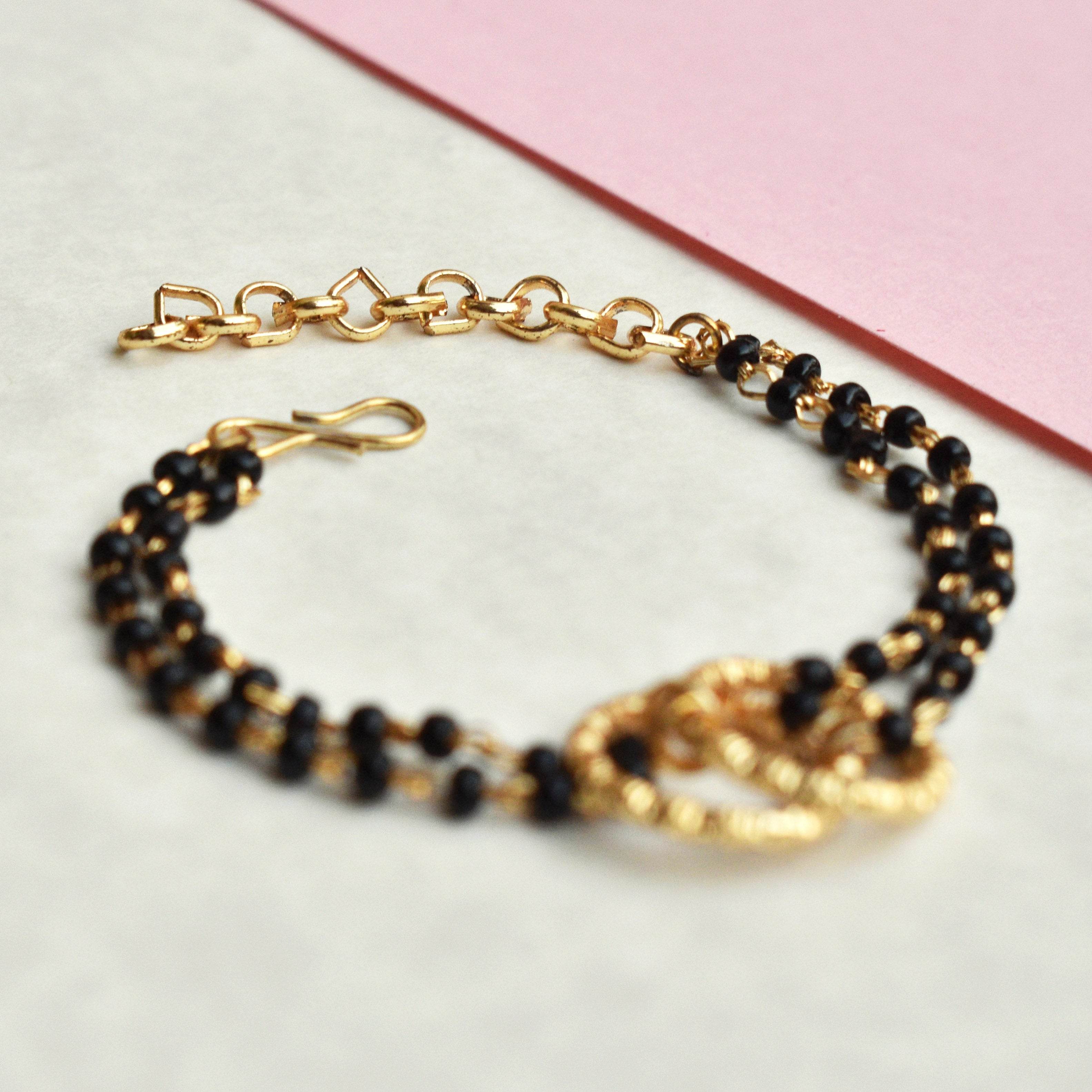 black beads mangalsutra bracelet Beabhika Black Color Bracelet Mangalsutra Bracelet Traditional Bracelet Modern Mangalsutra Bracelet Newly Wed Jewelry New Bride Gift Bride To Be Jewelry 1st Wedding Anniversay Gift For Wife Karvachauth Gift Online Cash On Delivery
