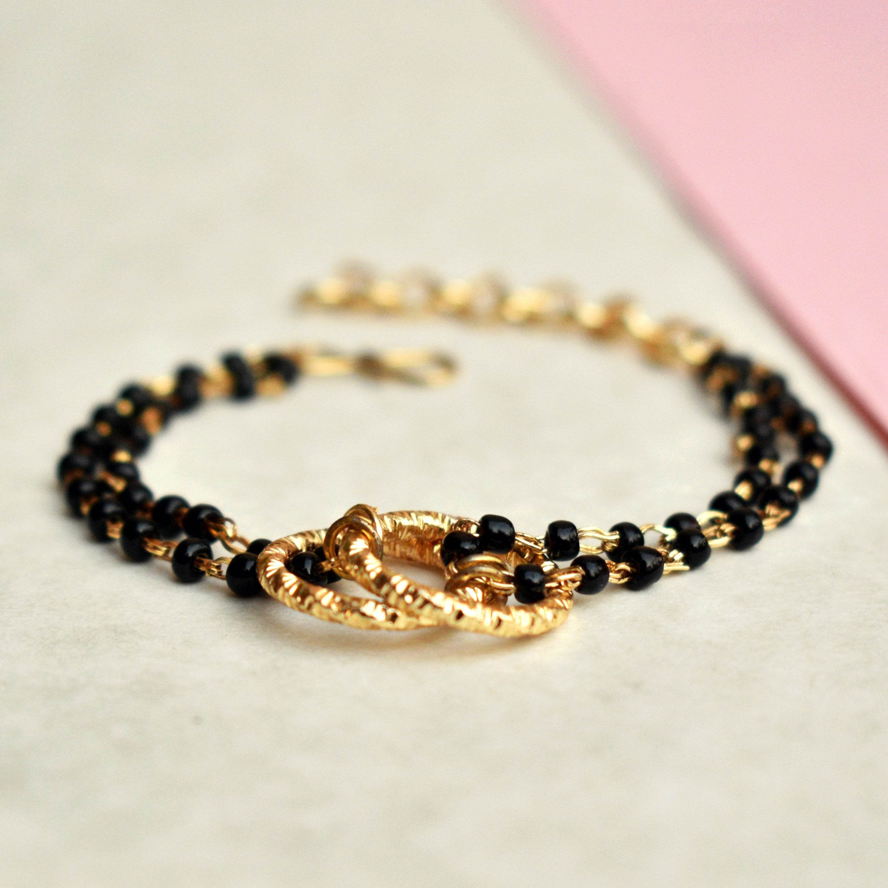 black beads mangalsutra bracelet Beabhika Black Color Bracelet Mangalsutra Bracelet Traditional Bracelet Modern Mangalsutra Bracelet Newly Wed Jewelry New Bride Gift Bride To Be Jewelry 1st Wedding Anniversay Gift For Wife Karvachauth Gift Online Cash On Delivery