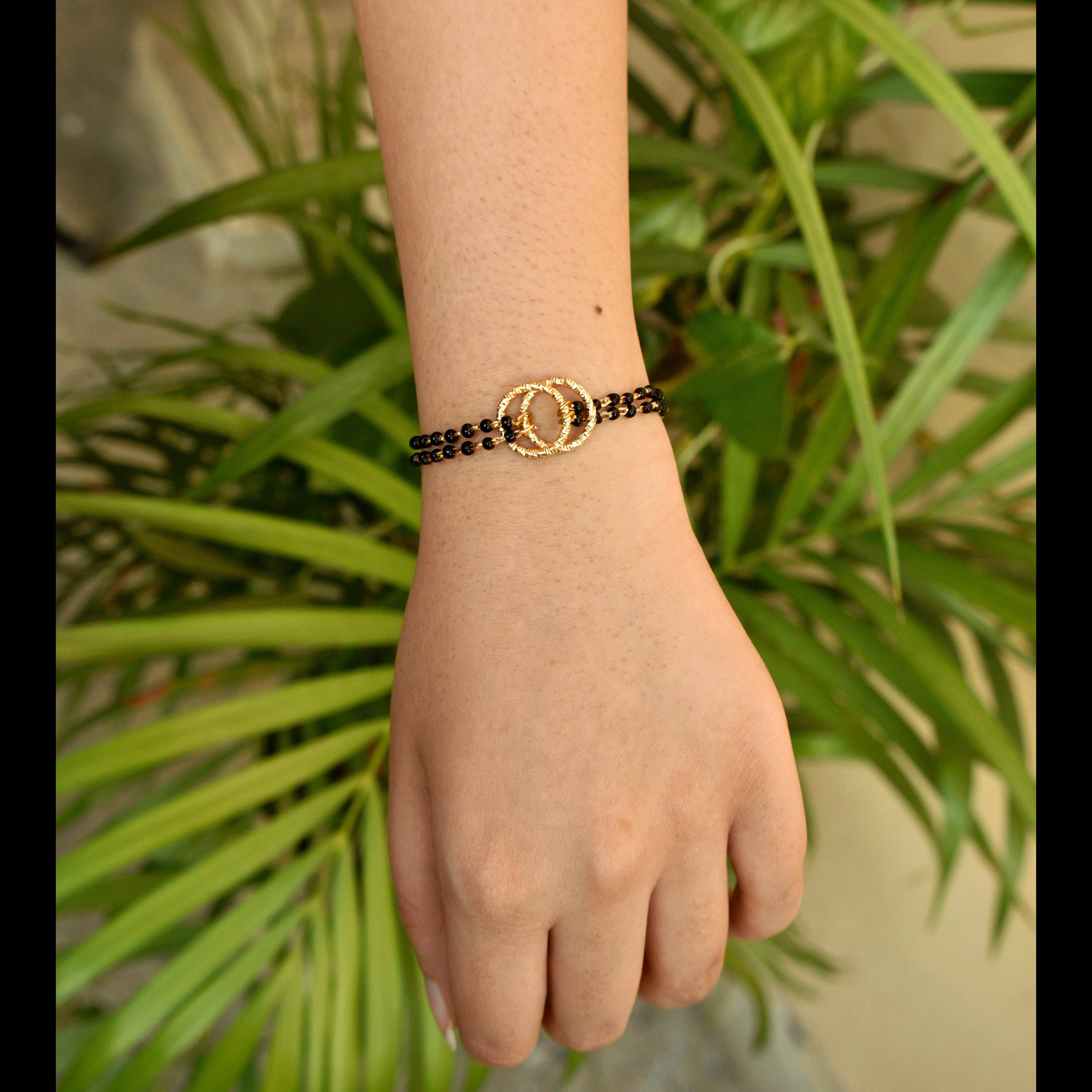 black beads mangalsutra bracelet Beabhika Black Color Bracelet Mangalsutra Bracelet Traditional Bracelet Modern Mangalsutra Bracelet Newly Wed Jewelry New Bride Gift Bride To Be Jewelry 1st Wedding Anniversay Gift For Wife Karvachauth Gift Online Cash On Delivery