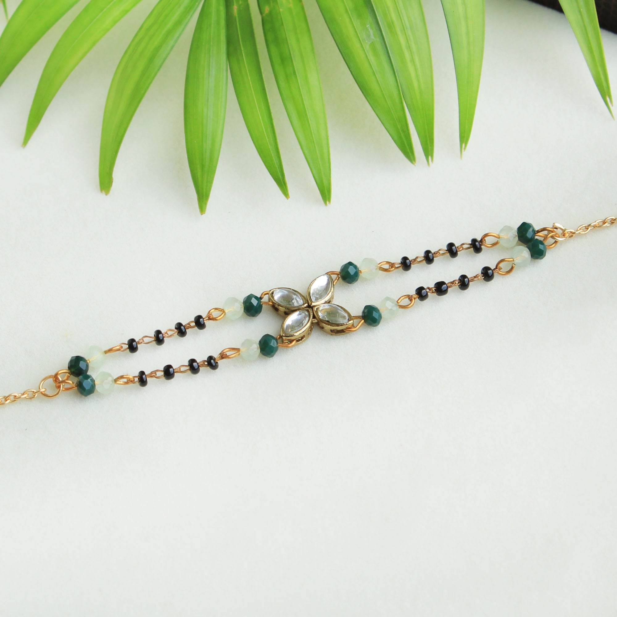 white glass kundan green, balck beads & mixed alloy