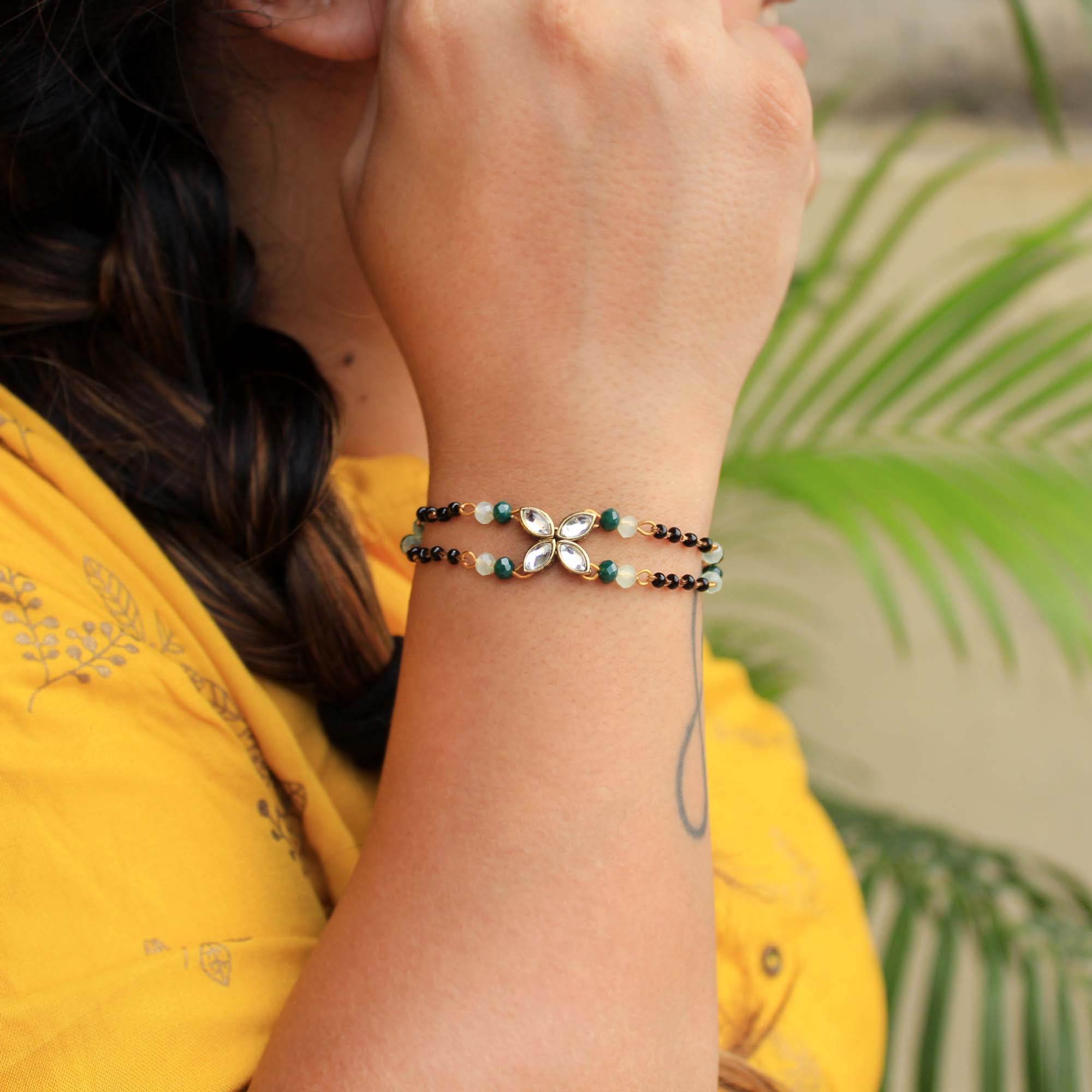 white glass kundan green, balck beads & mixed alloy
