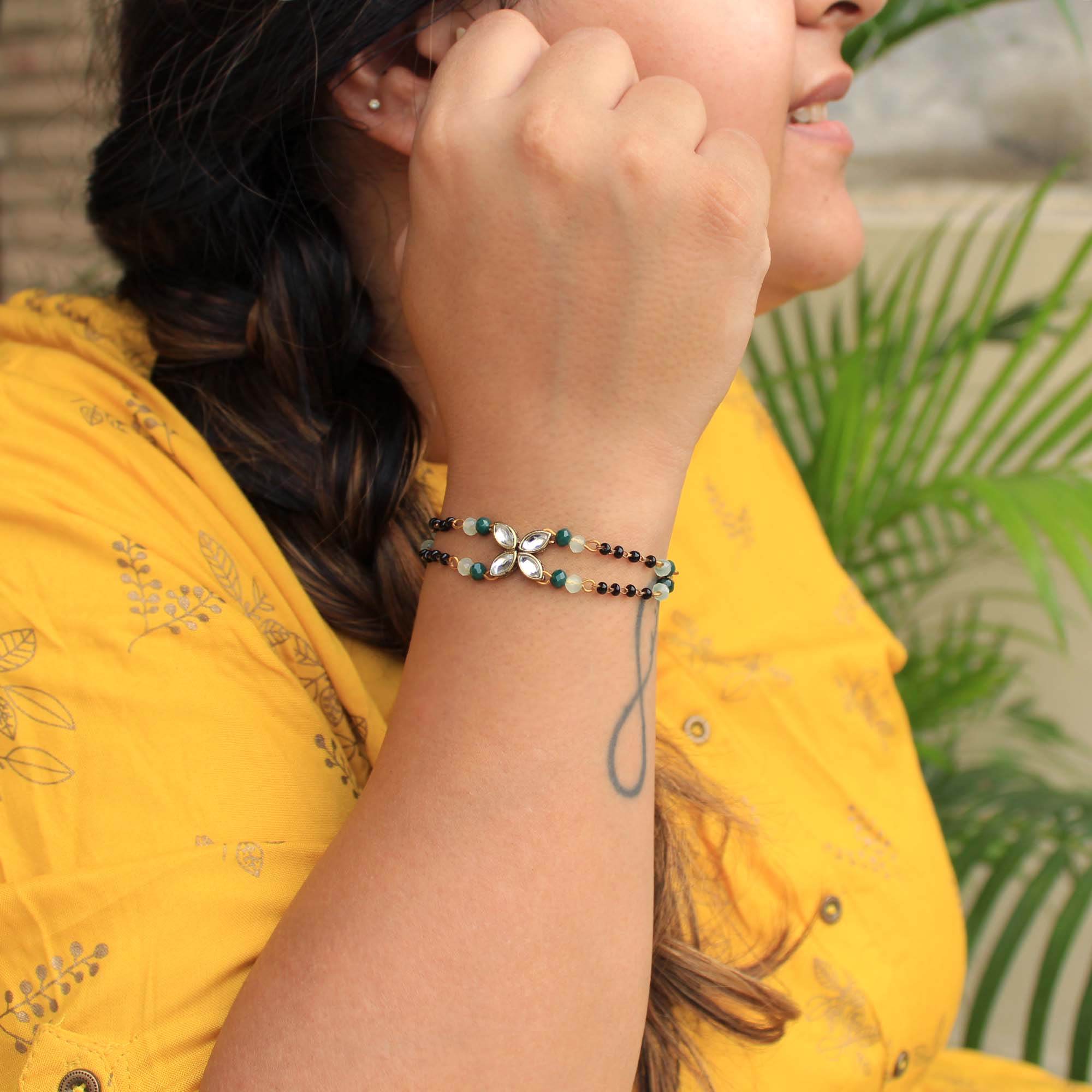 white glass kundan green, balck beads & mixed alloy