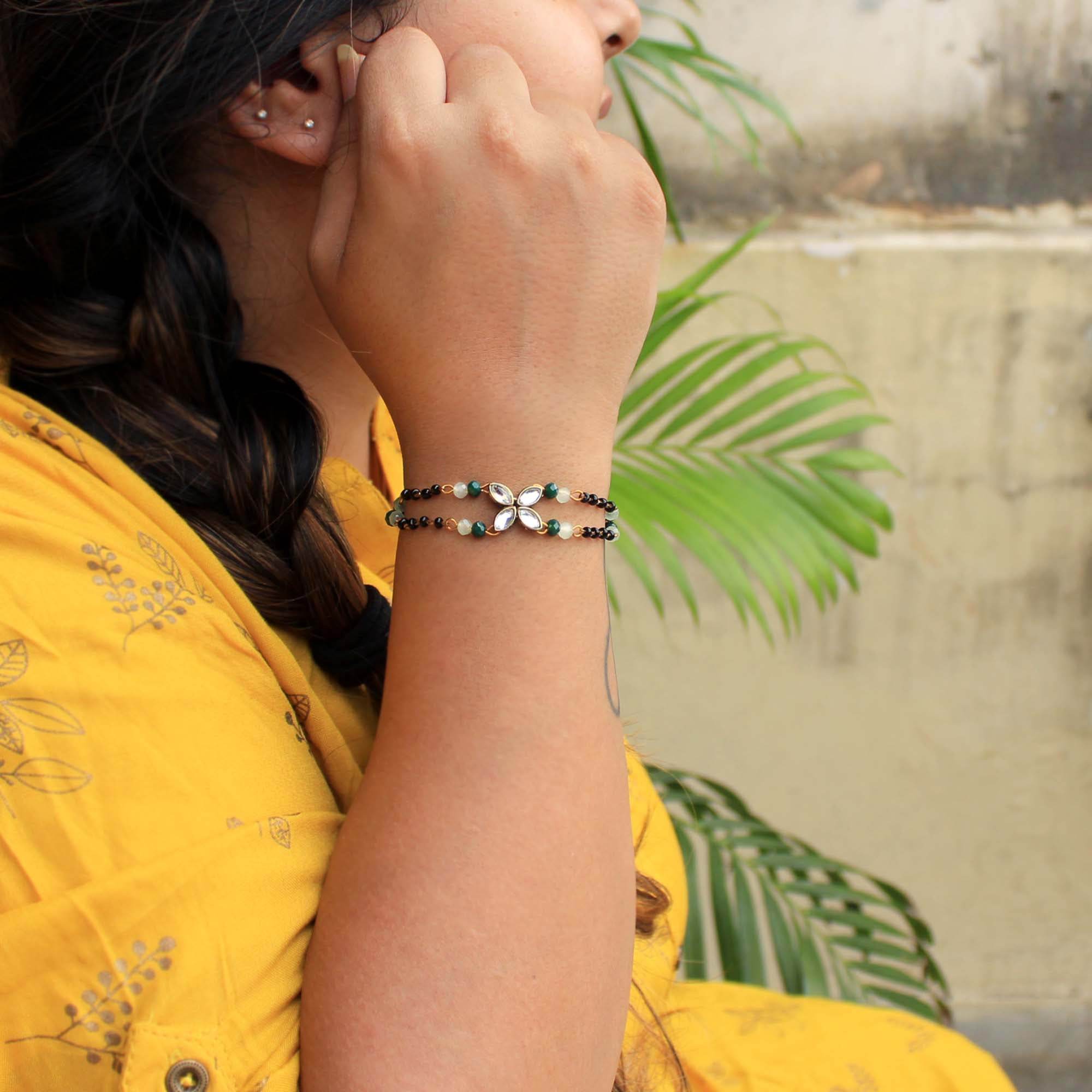 white glass kundan green, balck beads & mixed alloy