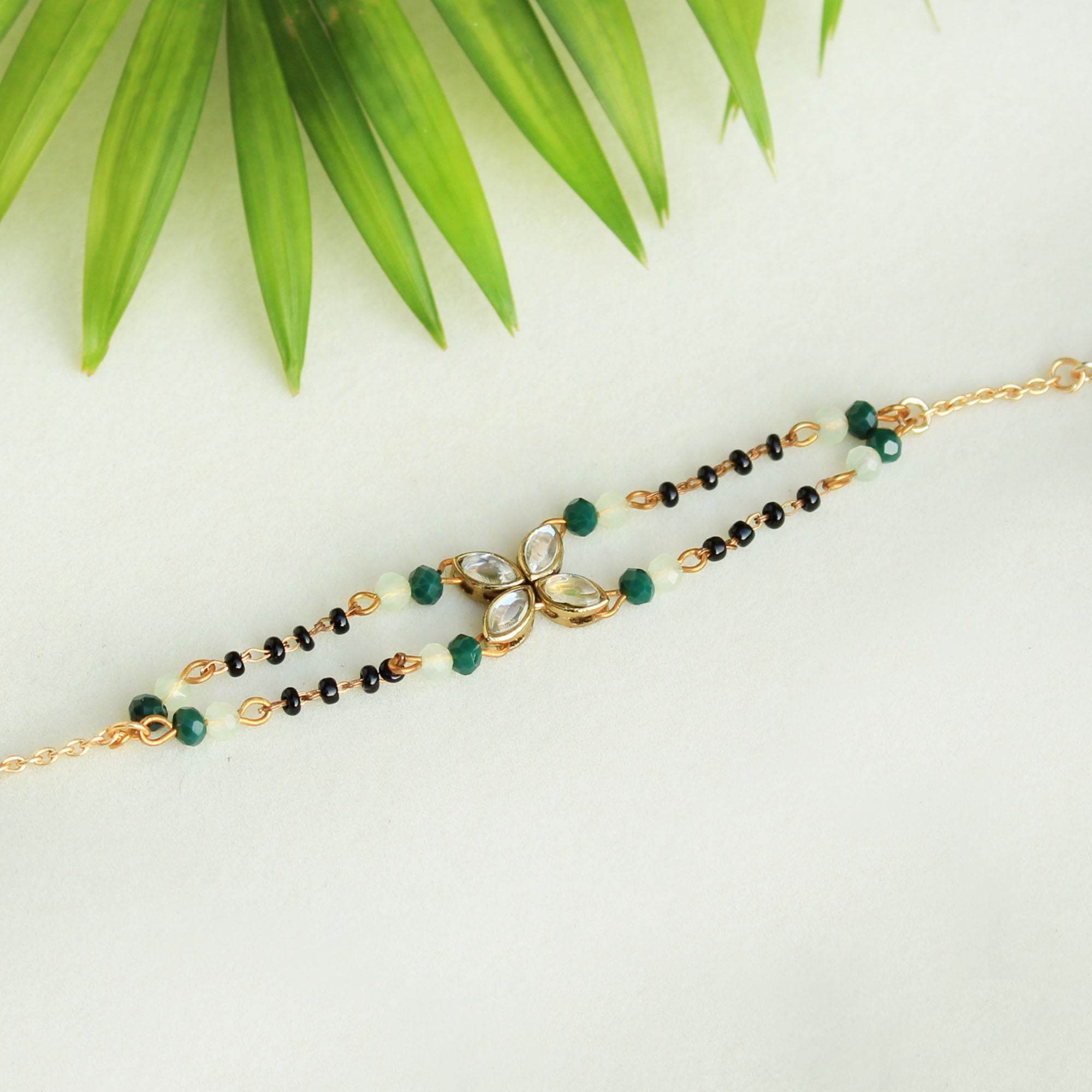 white glass kundan green, balck beads & mixed alloy