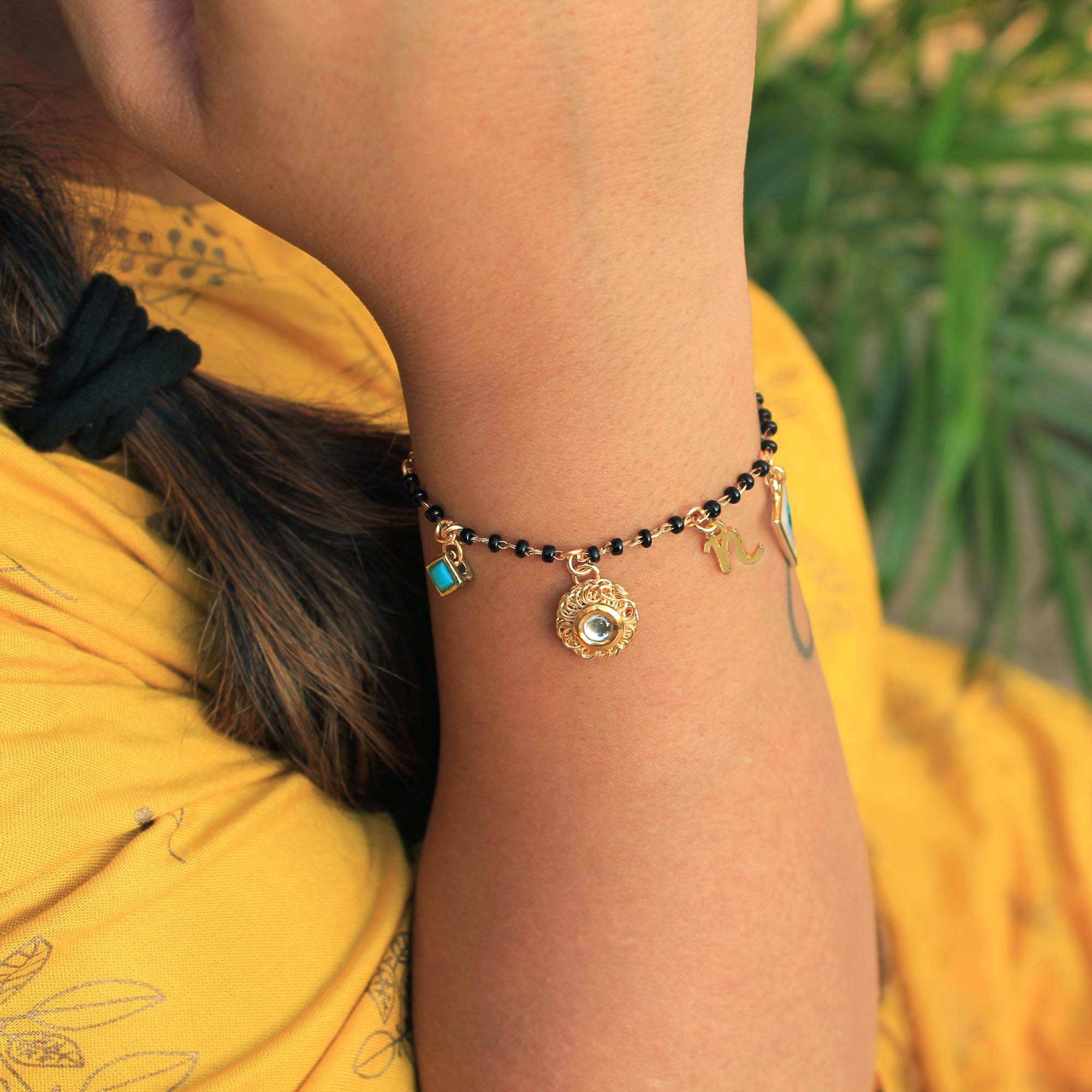 black beads enameled elements mangalsutra bracelet