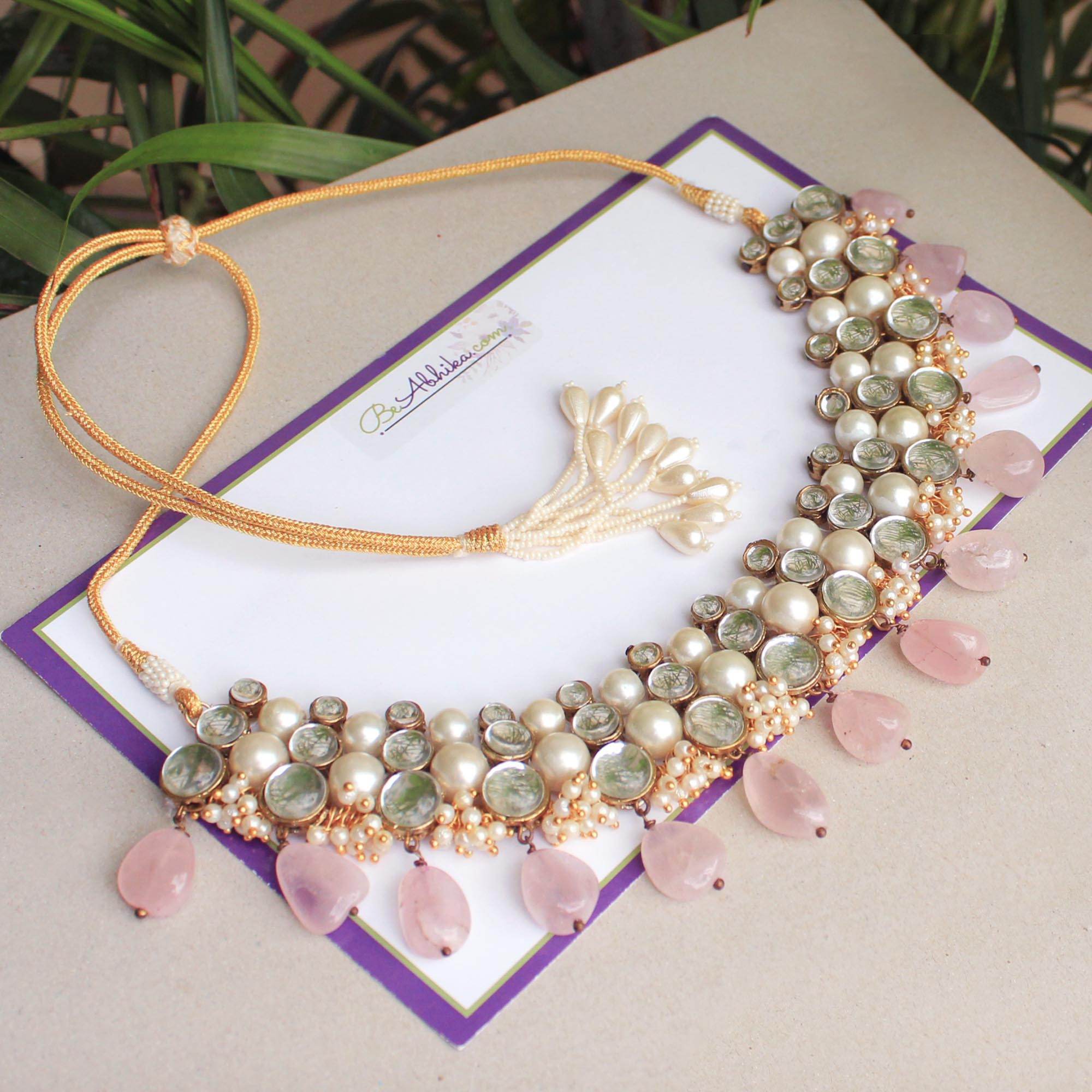 Kundan choker set in gold-tone with matching earrings and long bridal necklace, perfect for wedding functions , festive and bridal wear