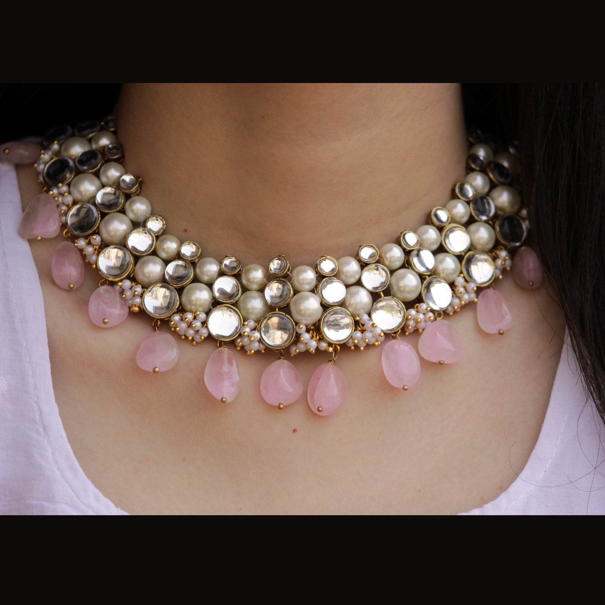 Kundan choker set in gold-tone with matching earrings and long bridal necklace, perfect for wedding functions , festive and bridal wear